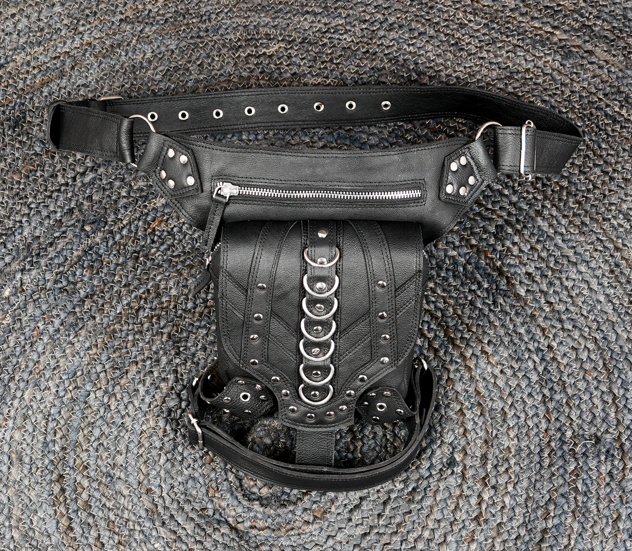 Leather accessory belt with thigh support and silver rivet work