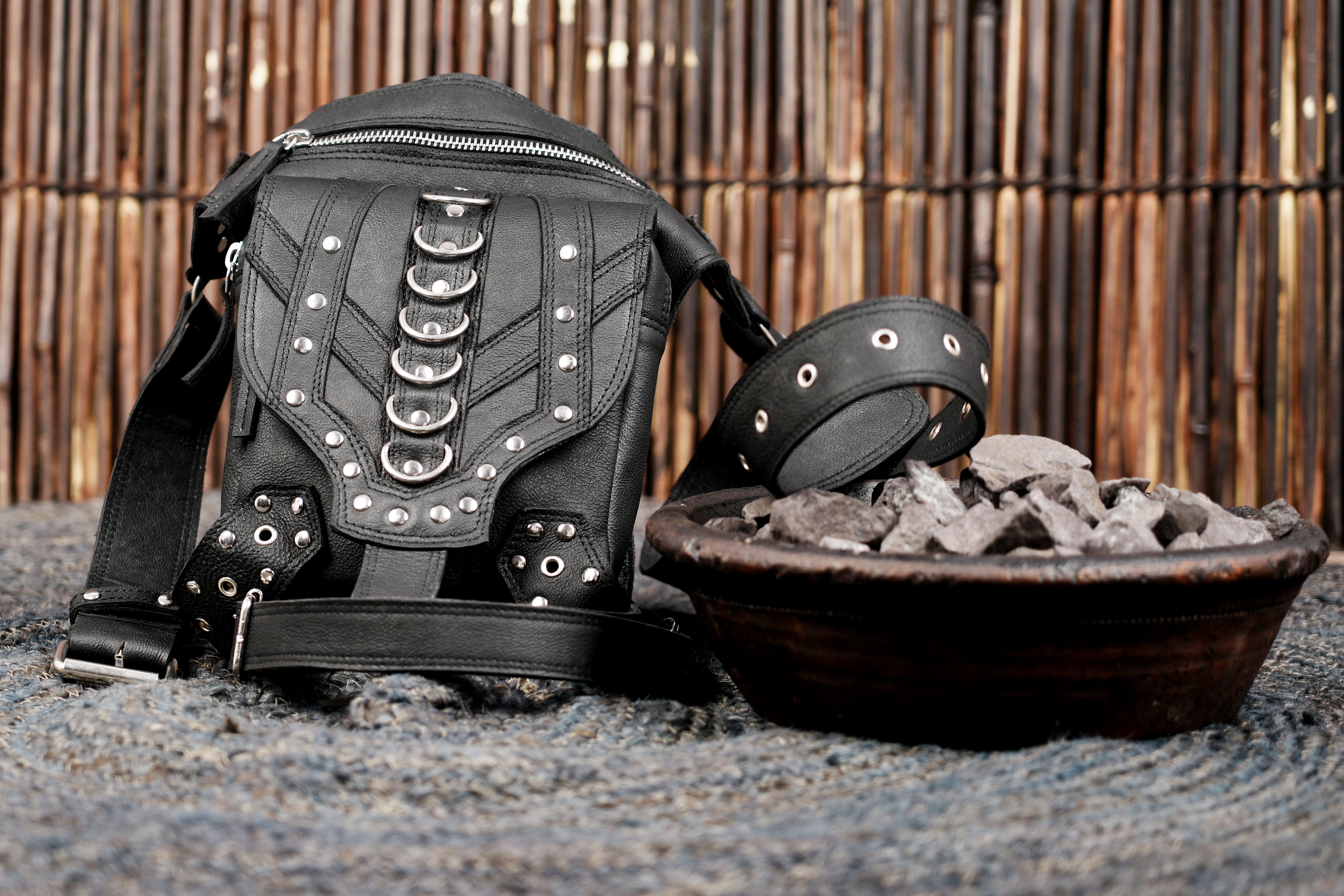 Black leather hip pouch belt with harness-style thigh strap