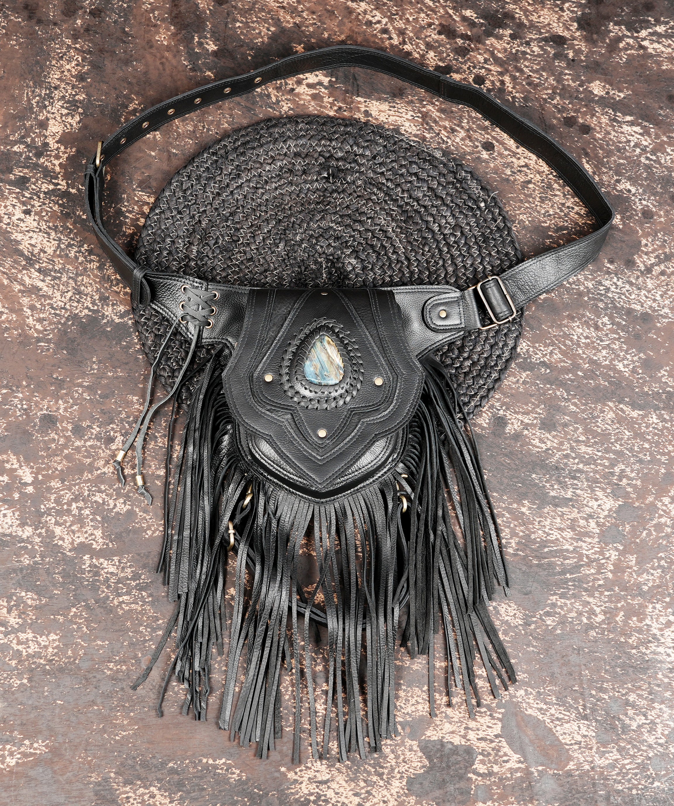 Black leather waist belt with fringe and gemstone centerpiece