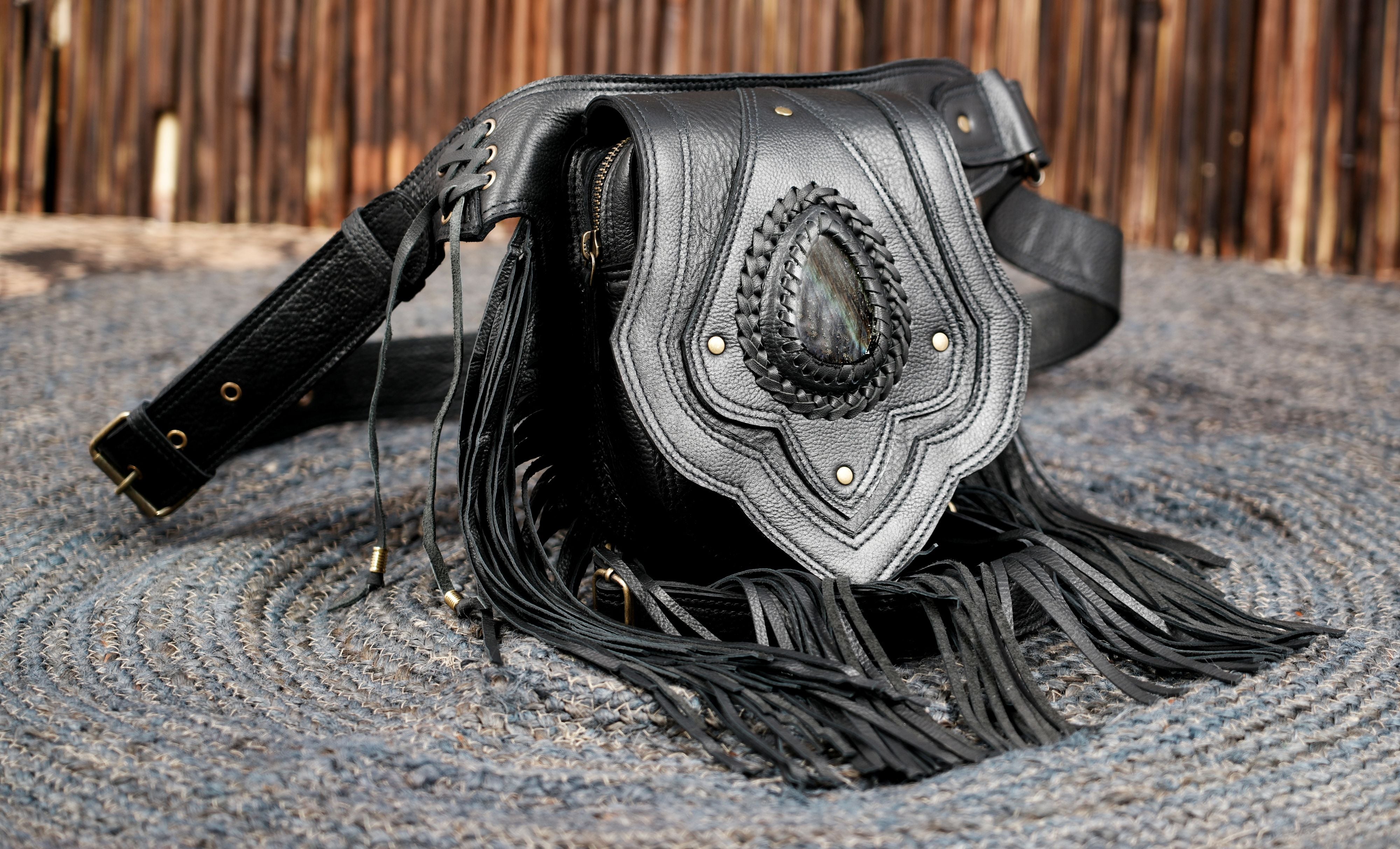 Leather fashion waist belt with long tassel fringe and stone detail