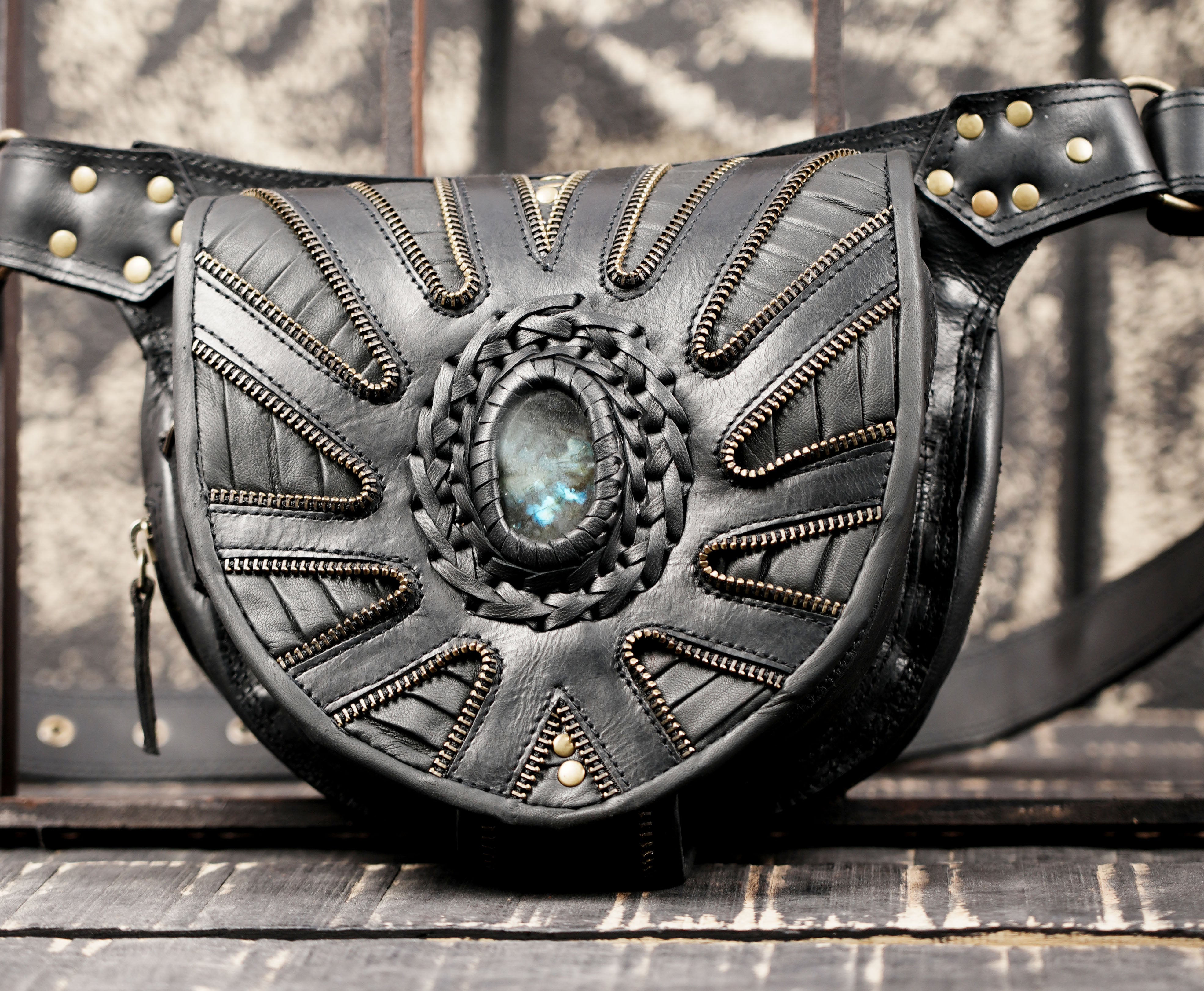 Leather waist bag with gemstone centerpiece