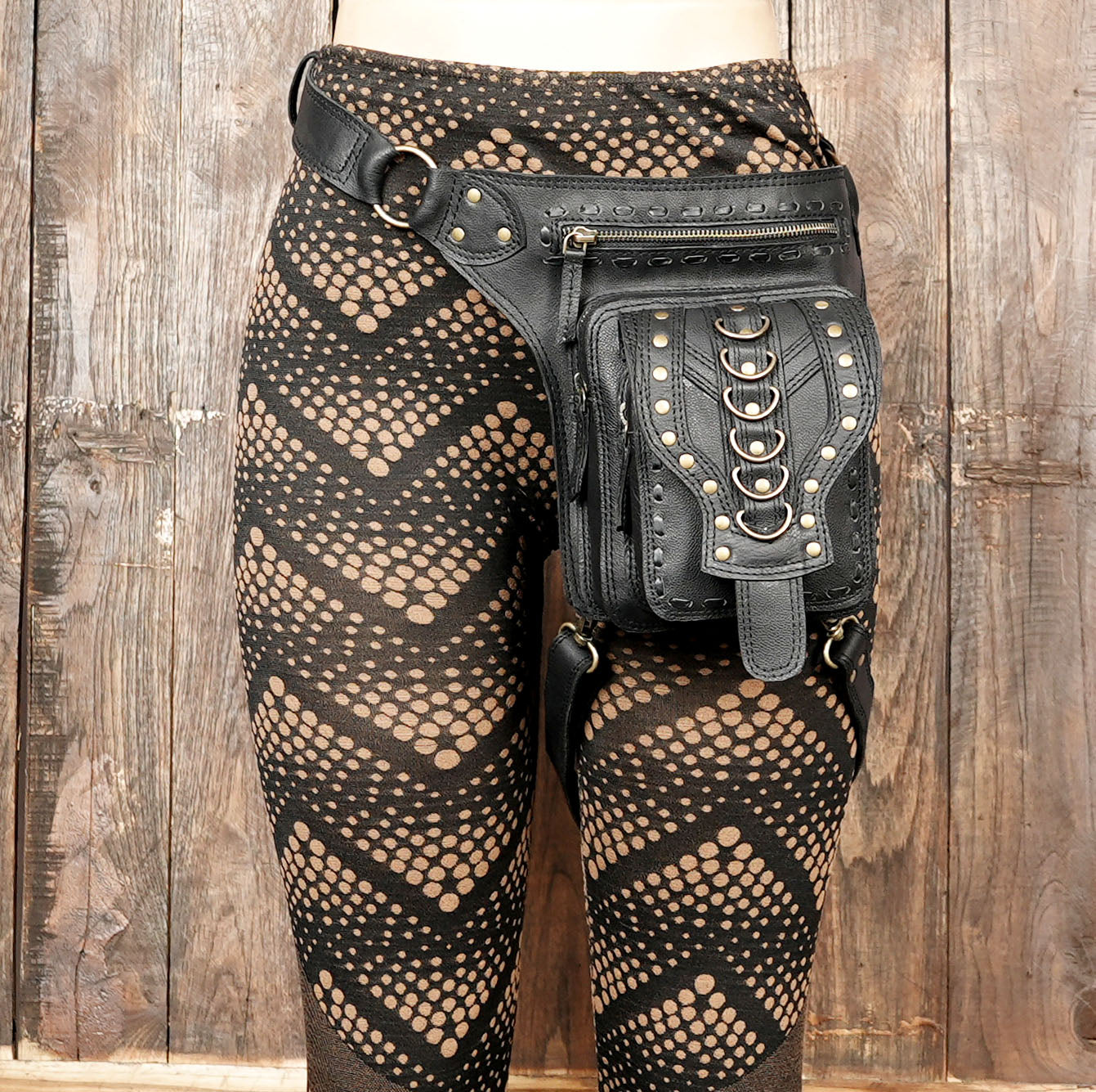 Handmade black leather leg belt with antique finish