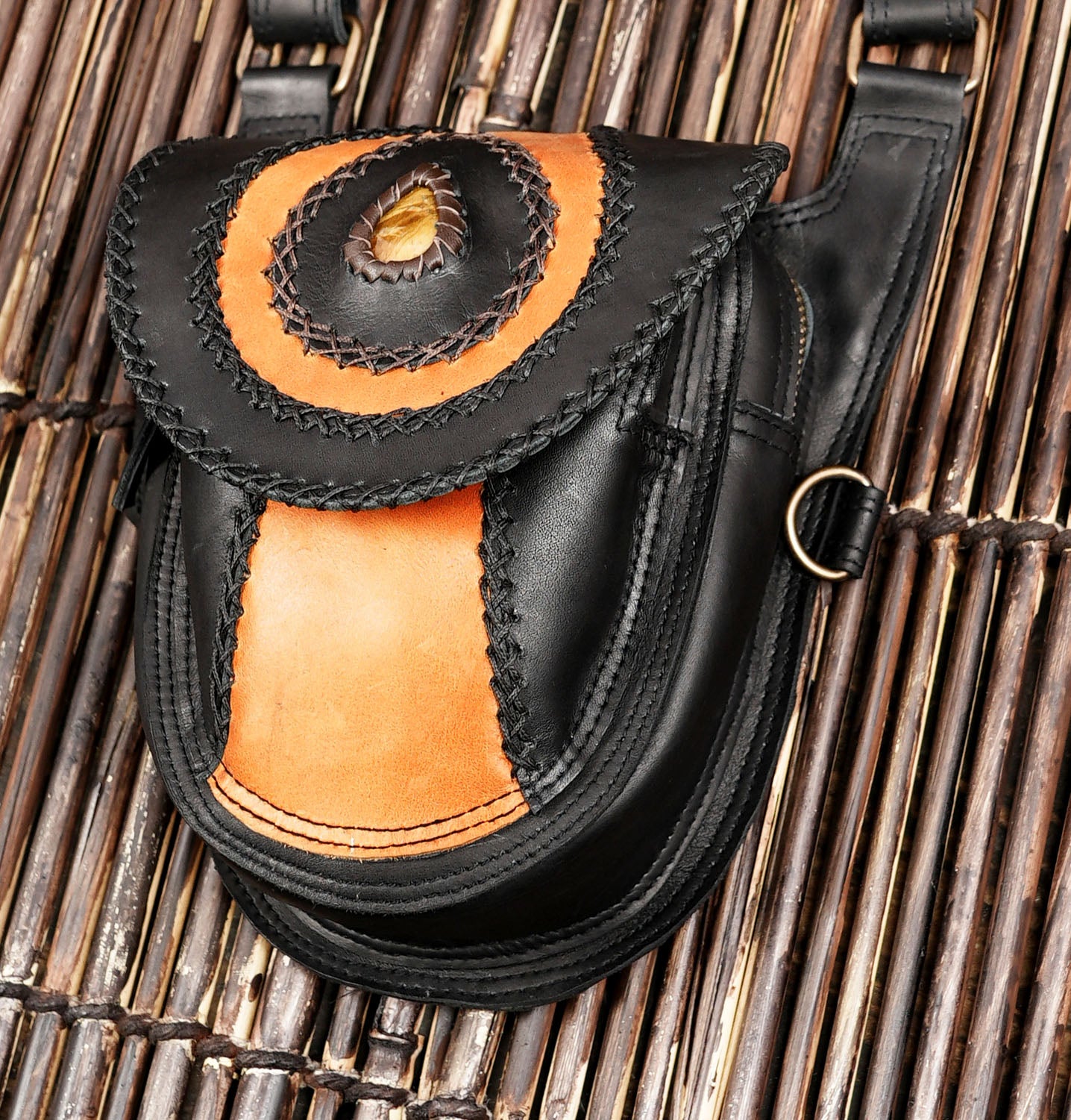 Adjustable leather shoulder holster for travel and festivals