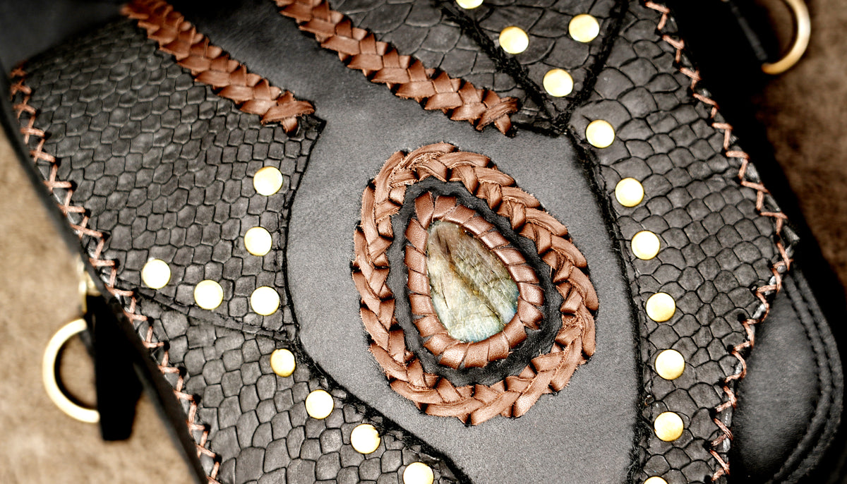 Fantasy leather shoulder harness with decorative gemstone accents