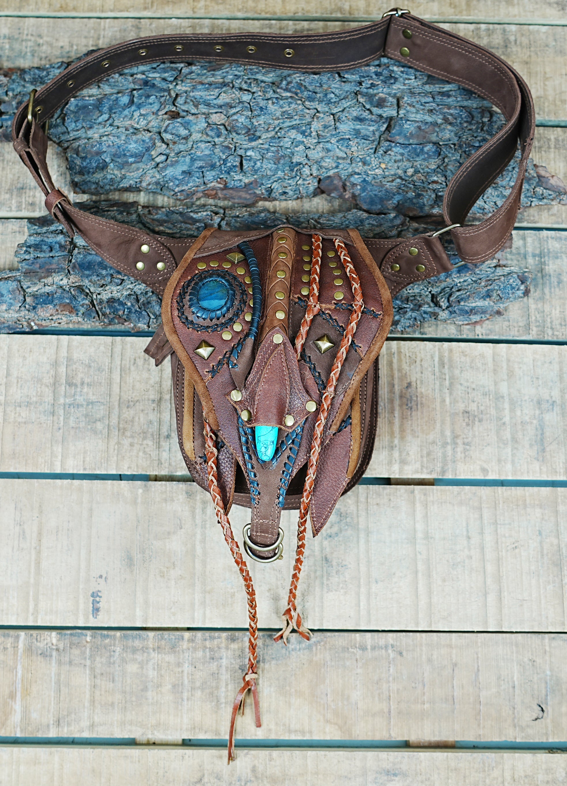 leather travel waist bag with decorative stitching"