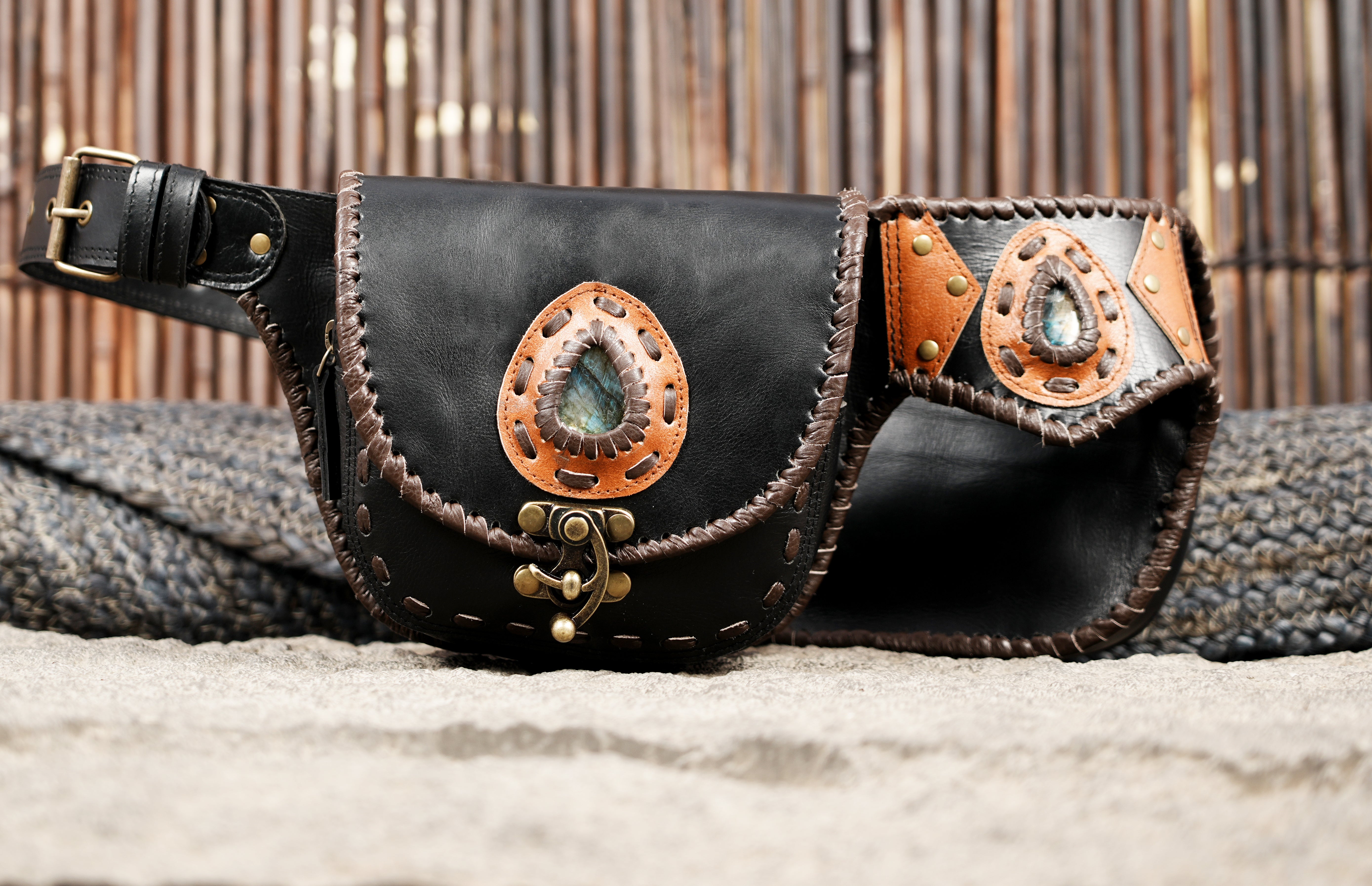 Adjustable black leather festival belt with brass accents