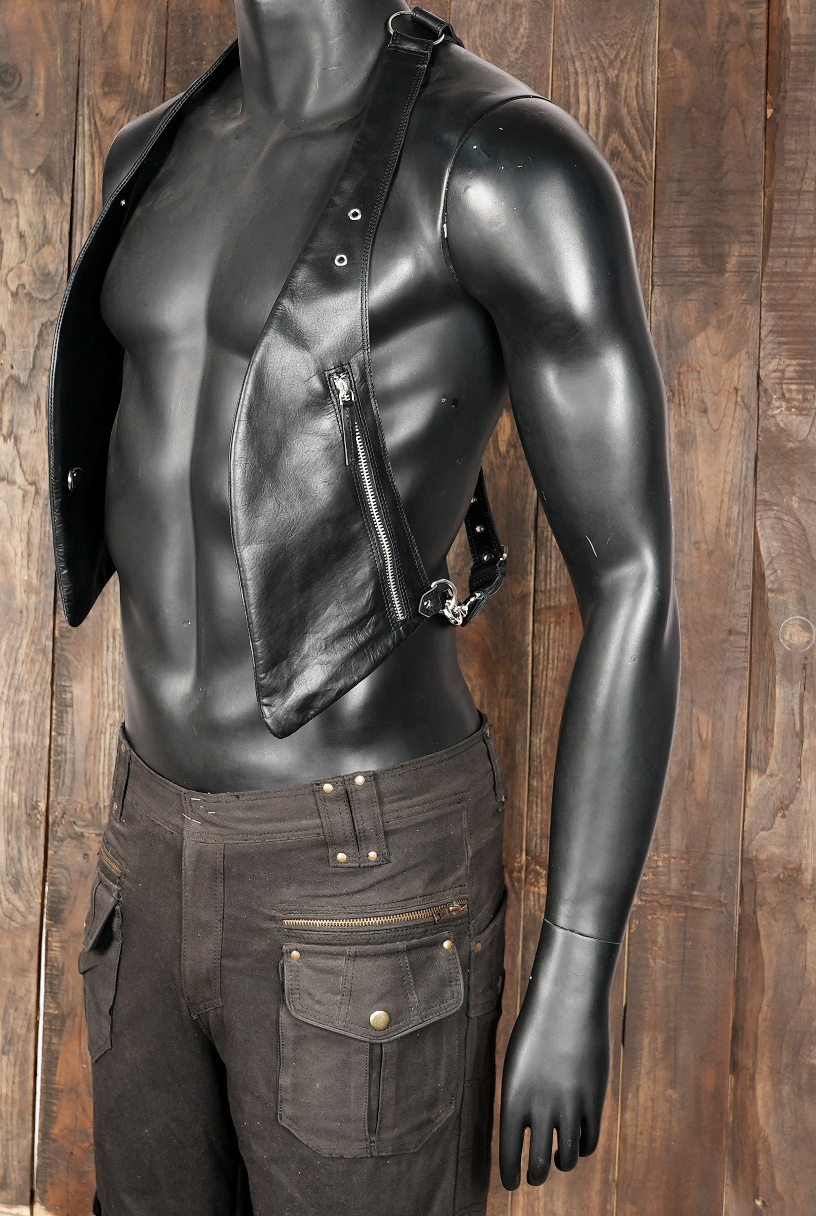 Leather shoulder harness with zip compartments and ring connectors