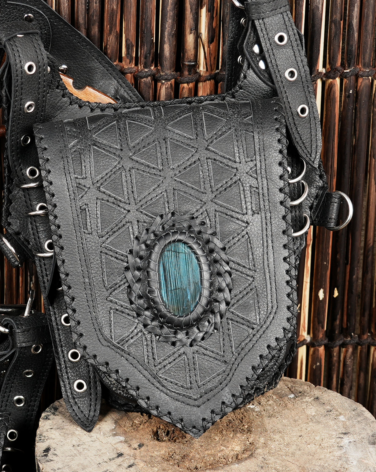 Boho black leather holster with embossed patterns and natural gemstone
