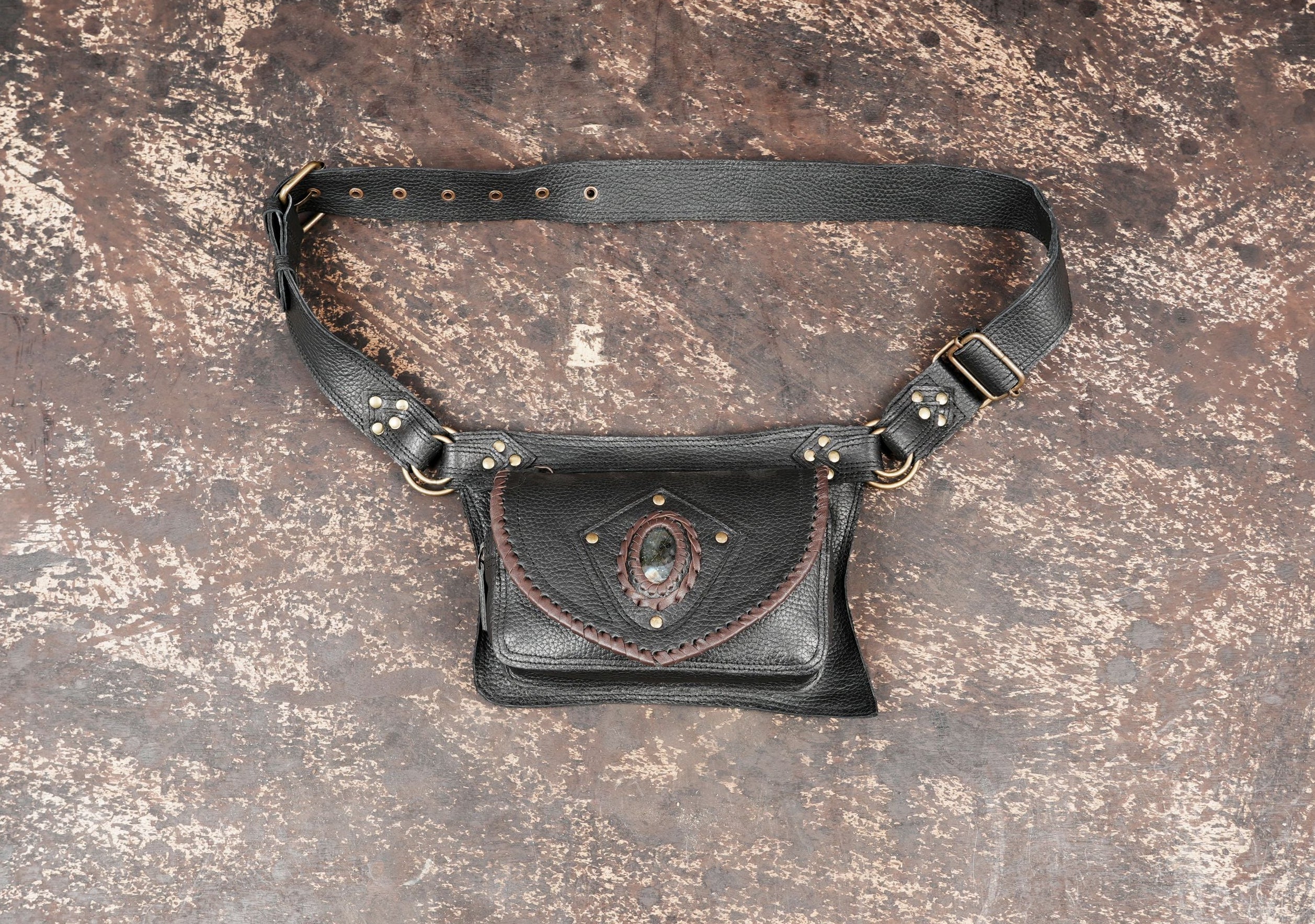 Black leather waist belt pouch with adjustable strap and stone detail