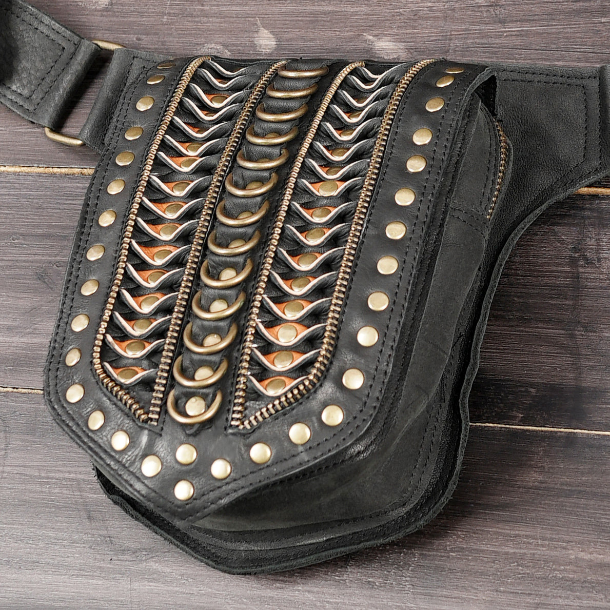 Stylish leather waist belt for men with metal studs and adjustable strap