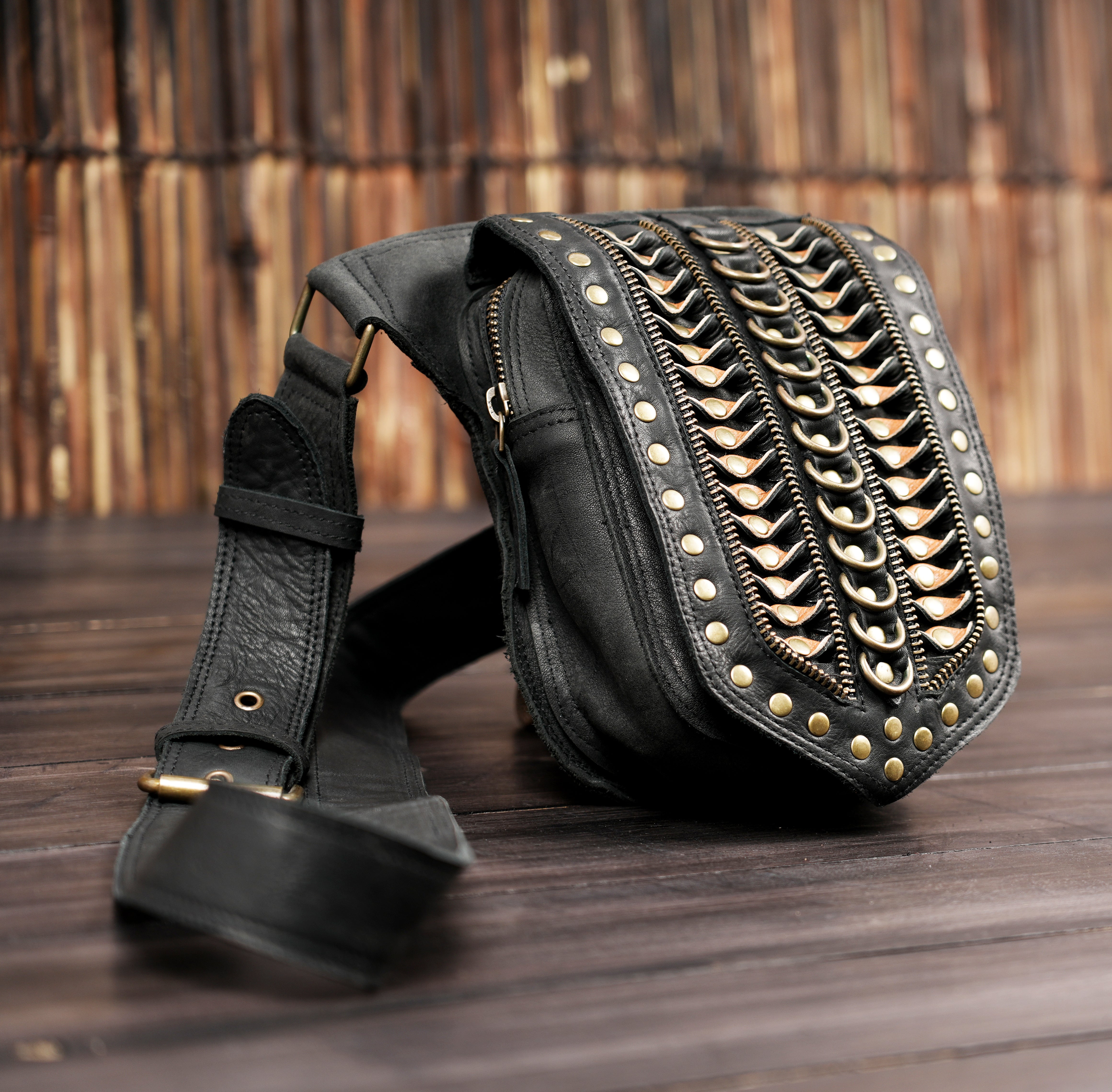 Genuine leather waist belt with bold stud design and vintage look