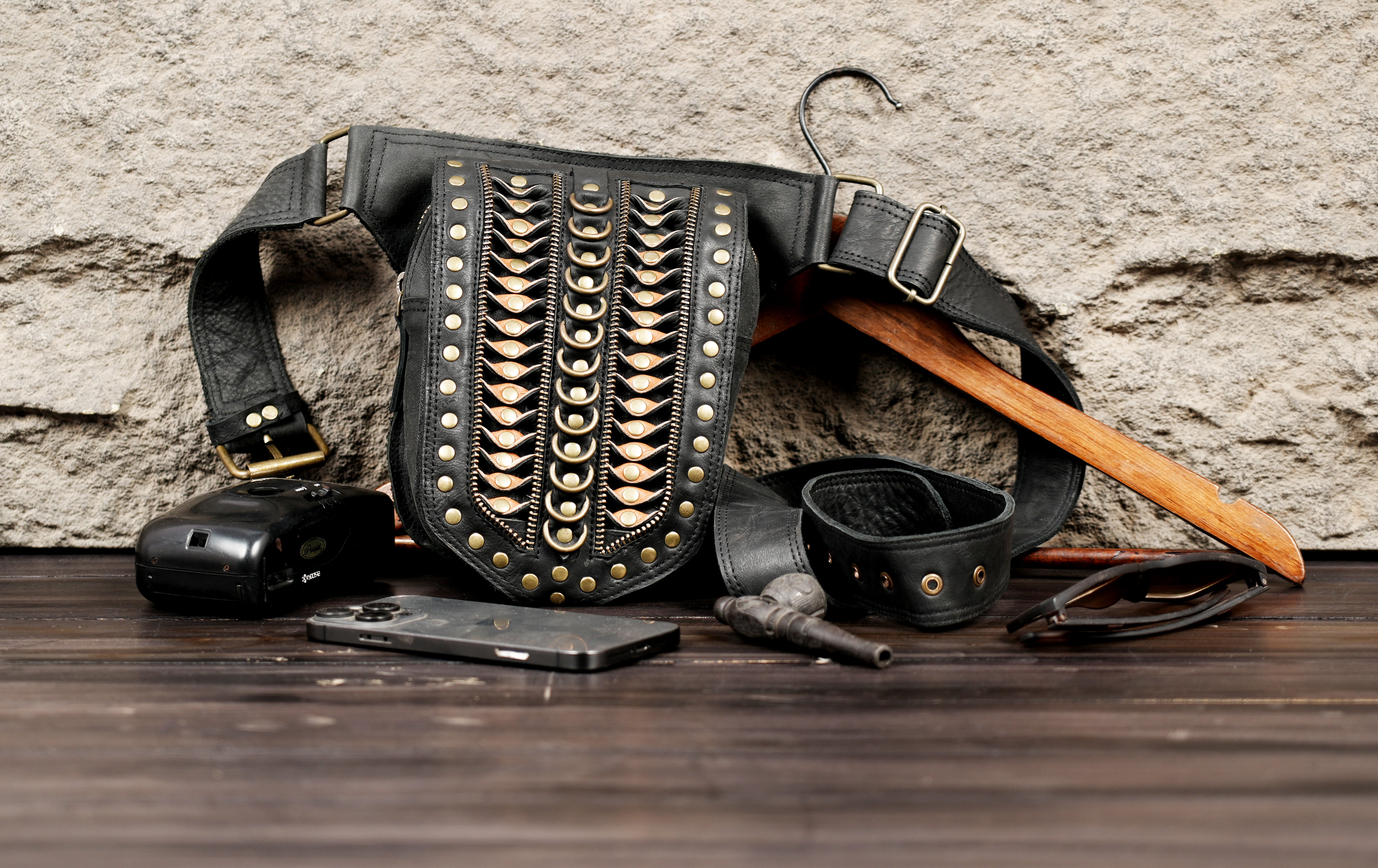 Men’s fashion leather waist belt with adjustable fit and metal detailing