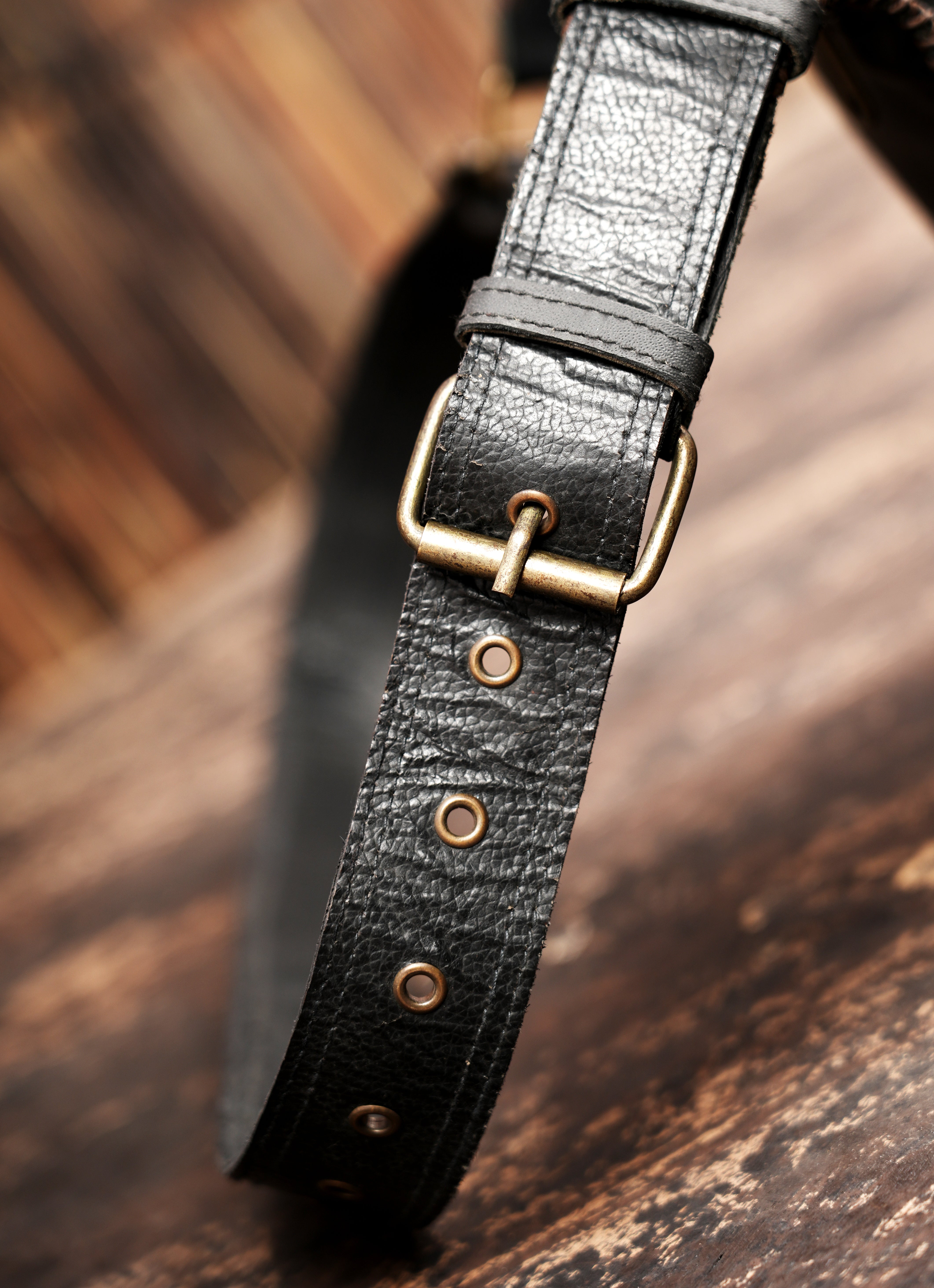 Unique leather waist belt with braided panel and rustic finish