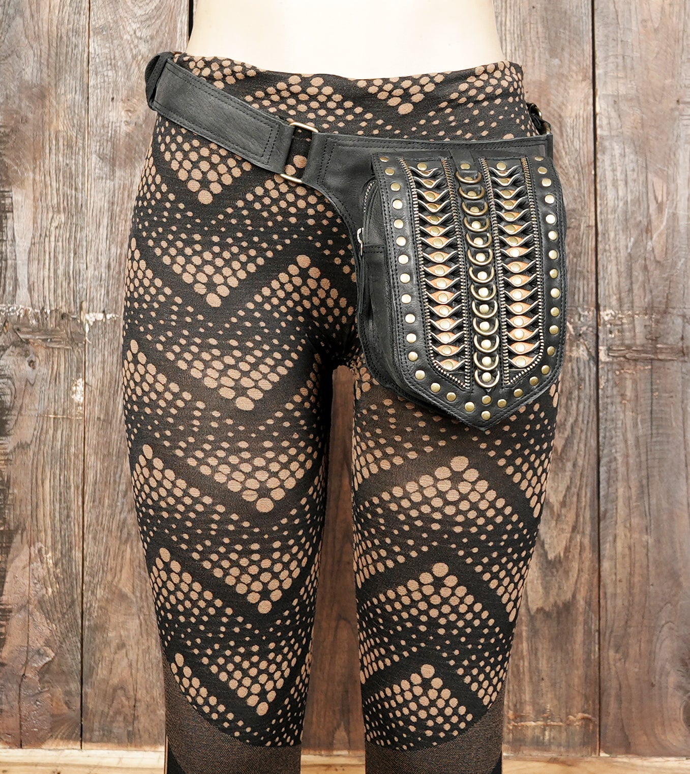 Black leather waist belt suitable for casual, biker, and festival wear