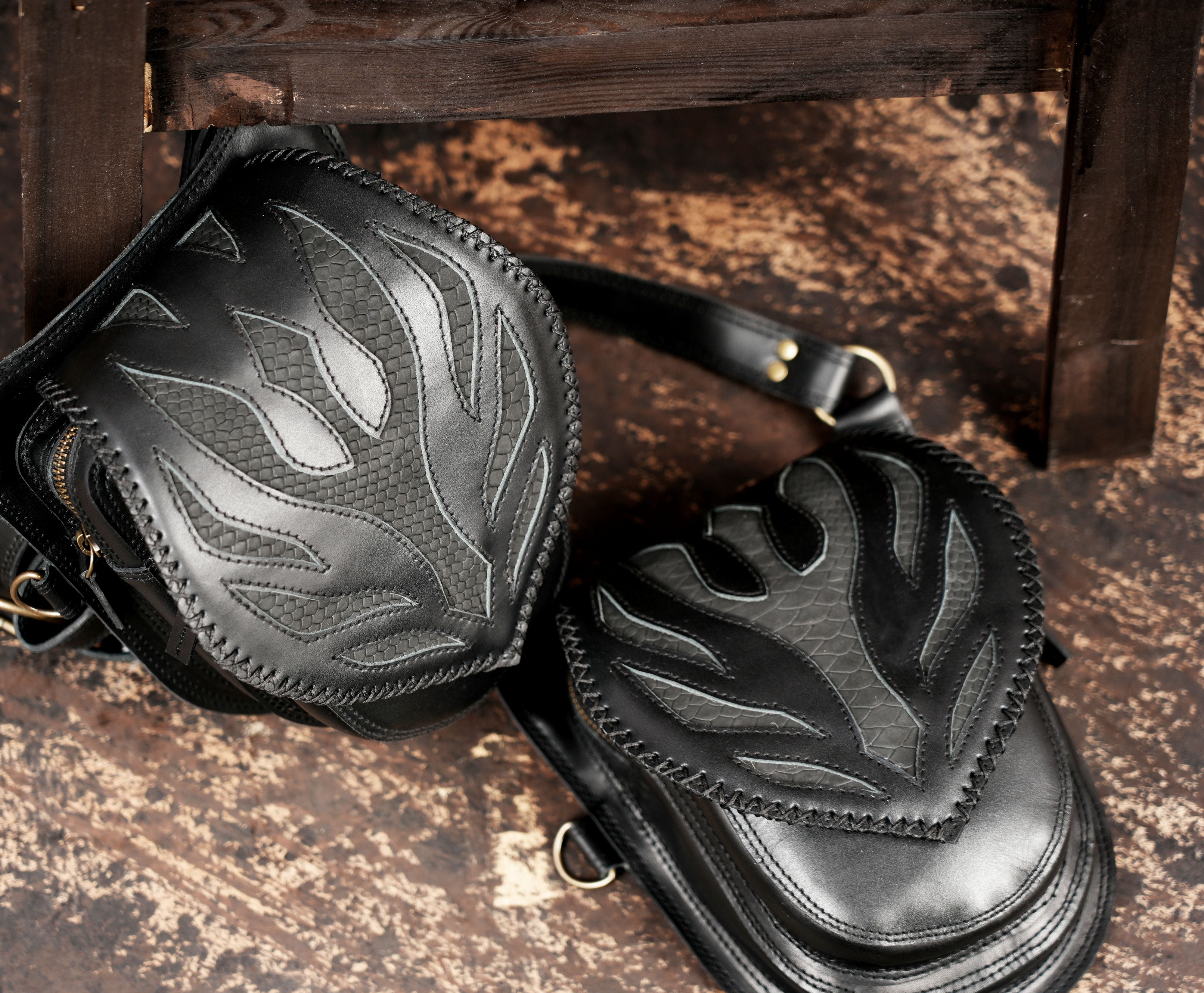 Black leather tactical holster pouch with vintage brass hardware