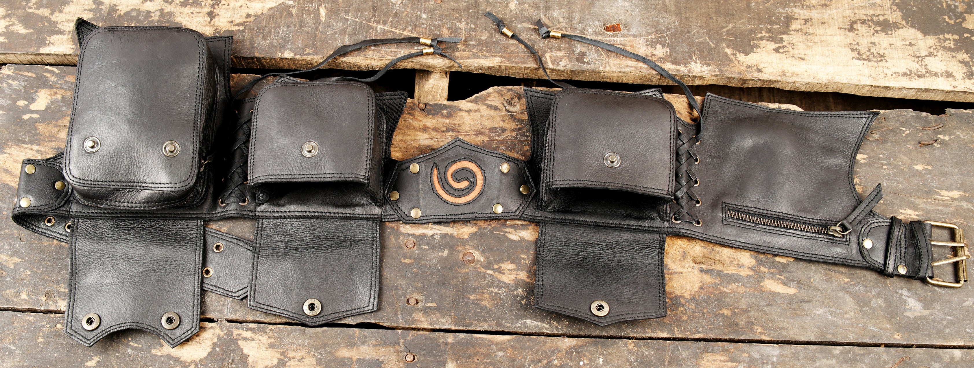 Multi-pocket black leather festival hip bag belt.