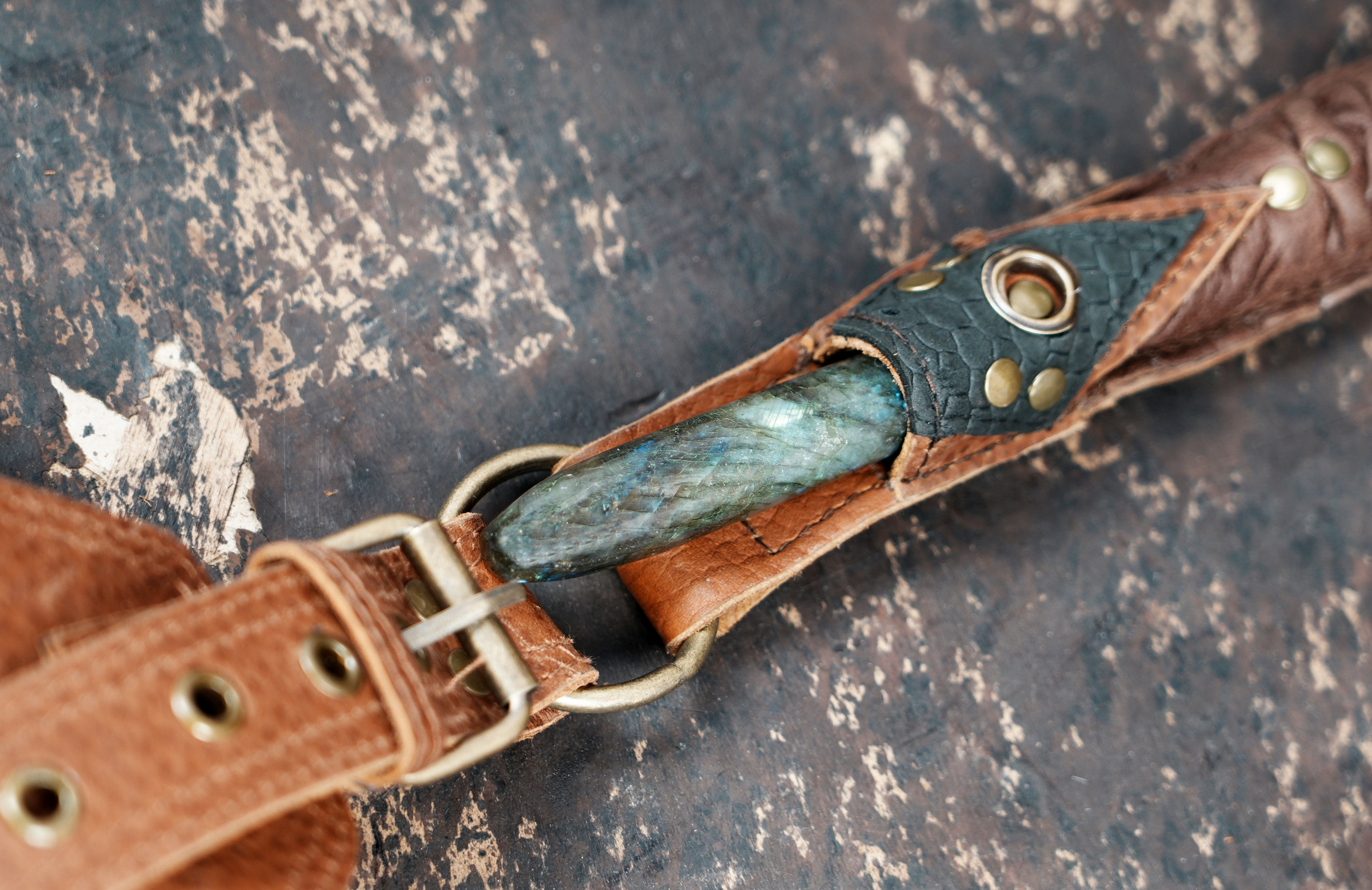 Leather shoulder holster bag with adjustable straps and buckle closure