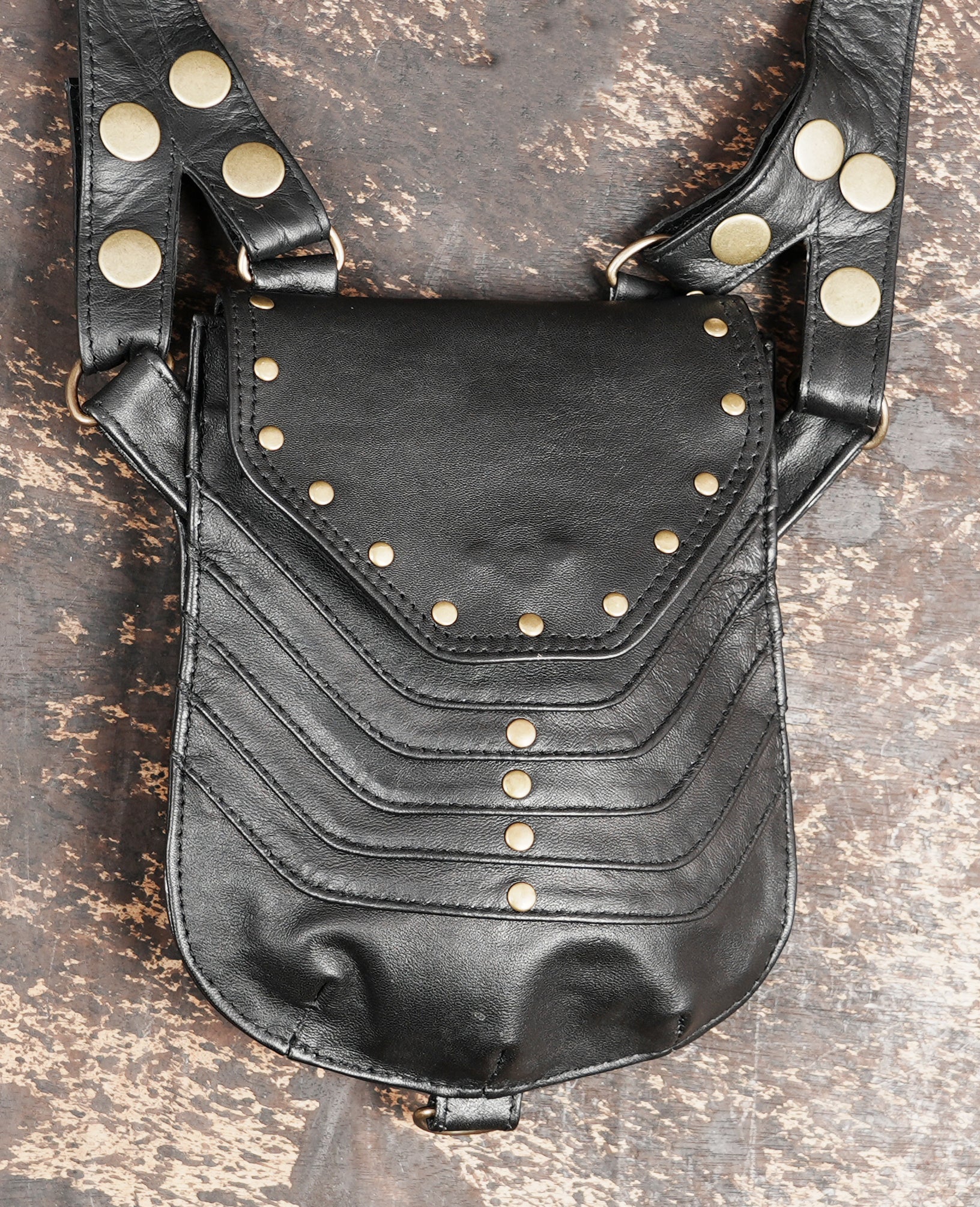 Genuine leather shoulder holster with adjustable straps and studs