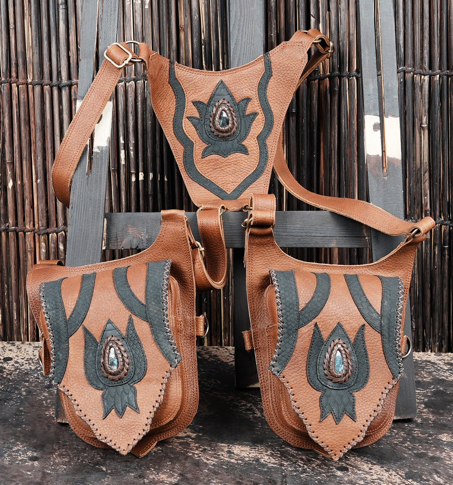 Handcrafted leather leg holster with decorative stone centerpiece