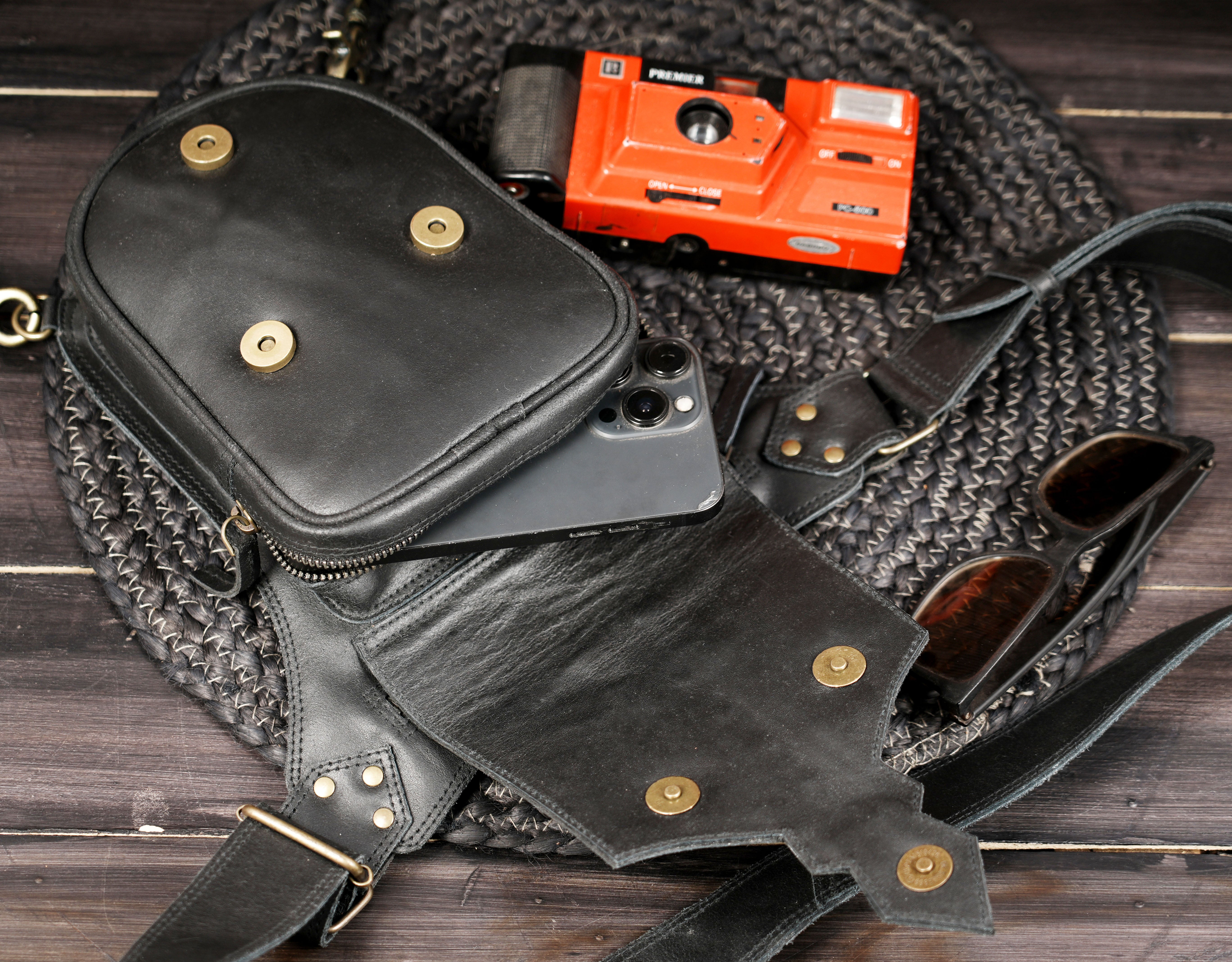 Adjustable black leather waist thigh belt with metal hardware