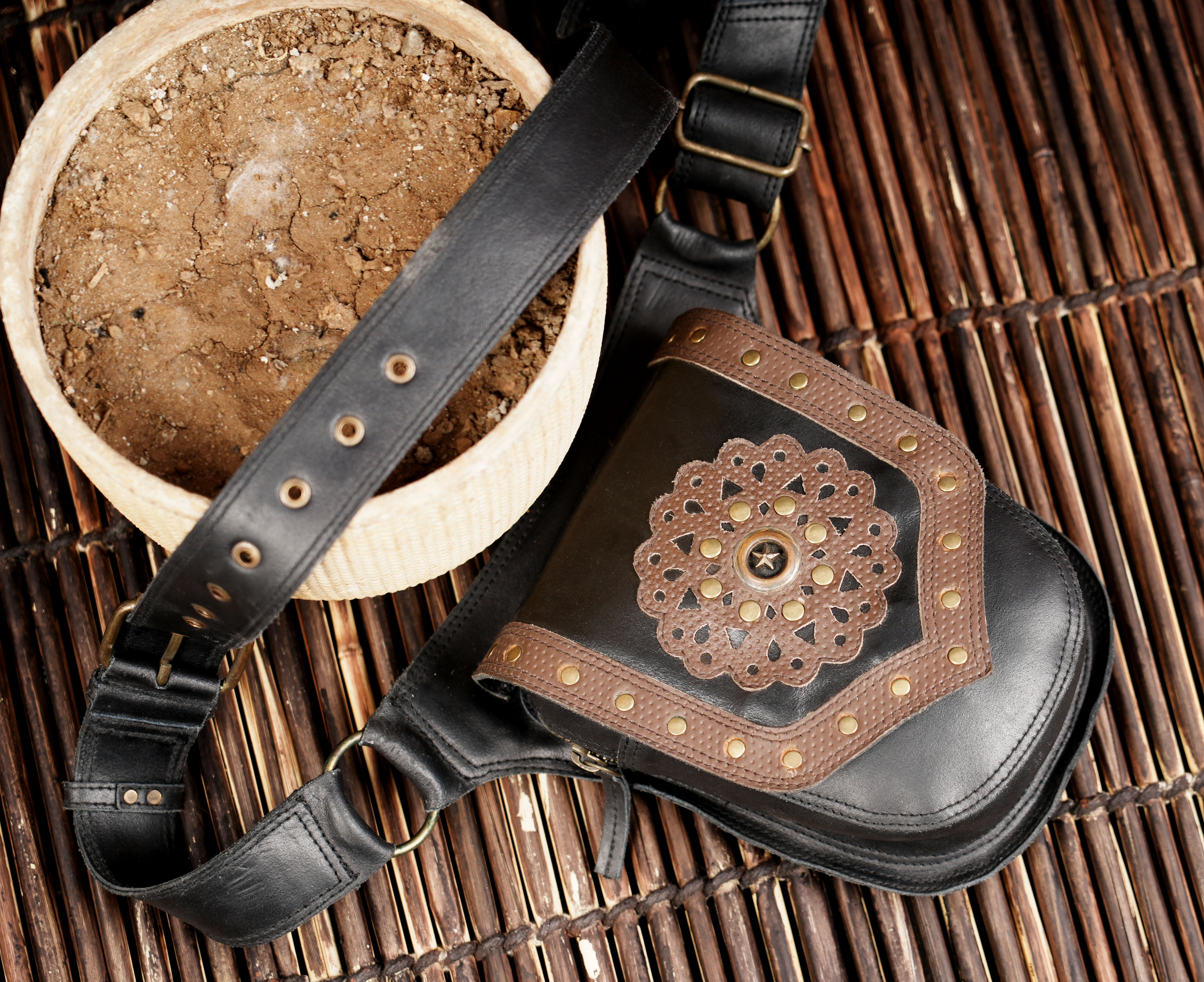 Adjustable leather waist belt with front pouch and buckle strap