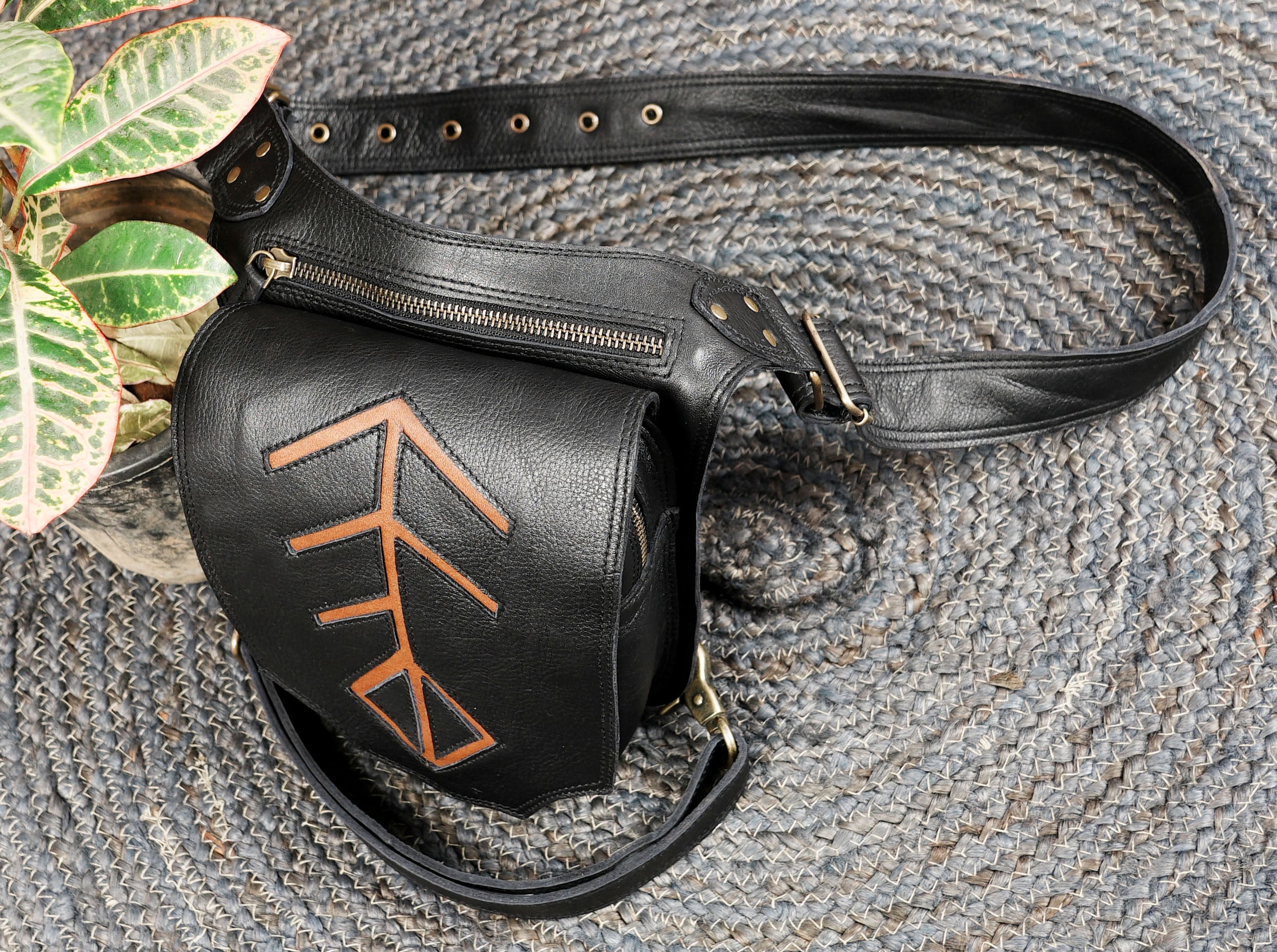 Artisan leather thigh belt with bold geometric pattern