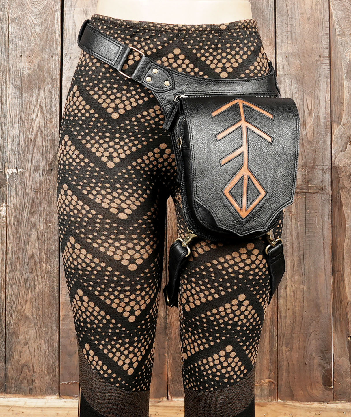 Black leather waist thigh belt with artisan detailing