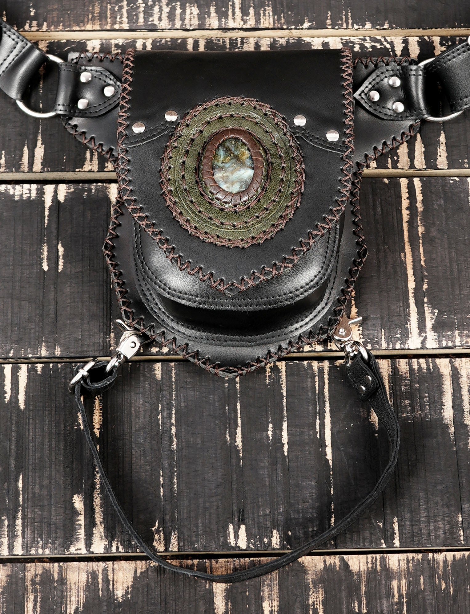 Handmade leather thigh belt with natural stone centerpiece and stitching