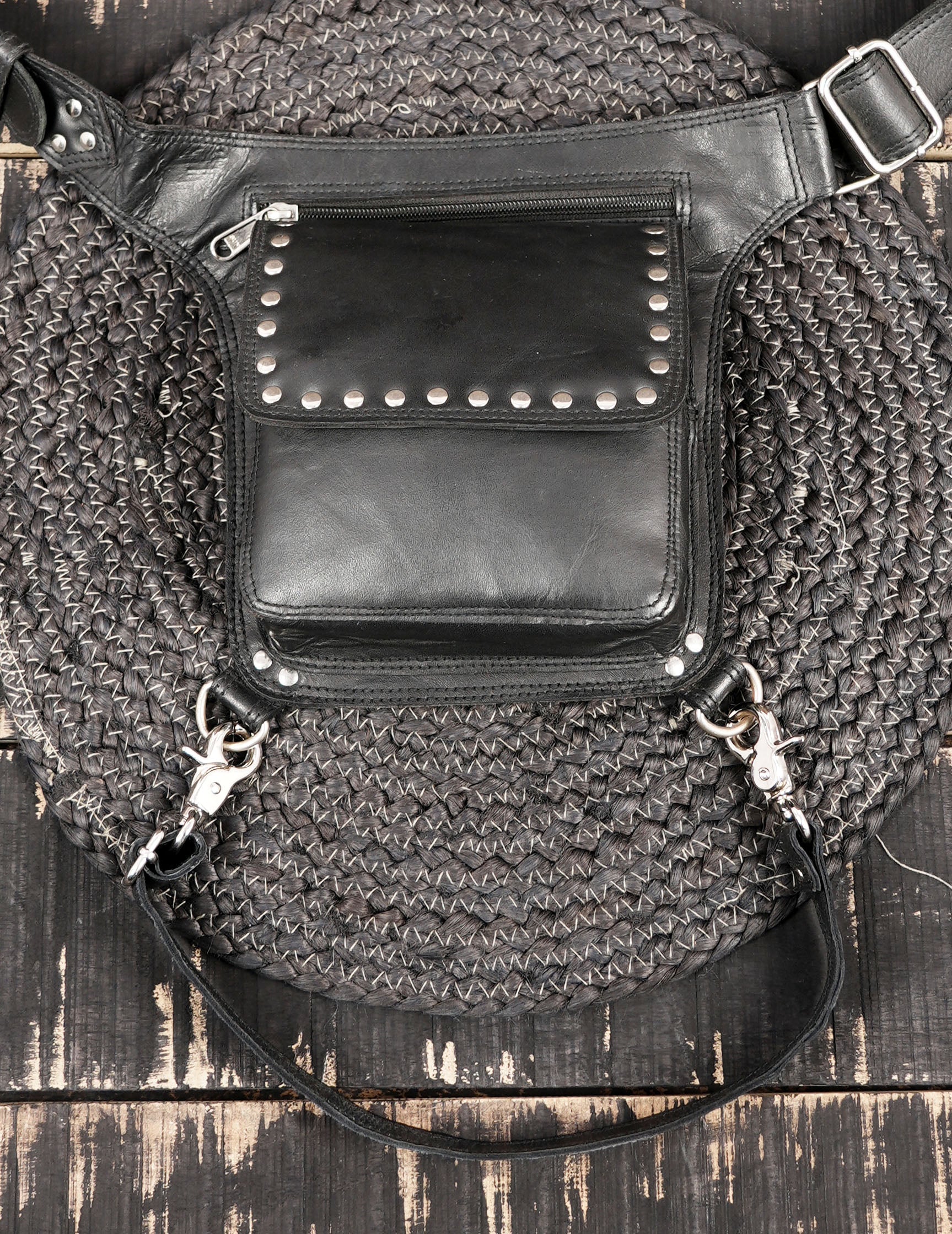 Handmade leather thigh holster belt with metal studs and buckles