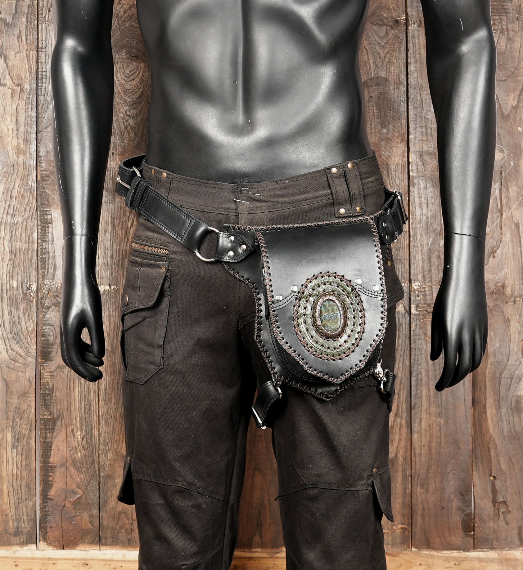 Hand-tooled leather thigh belt with gemstone detailing