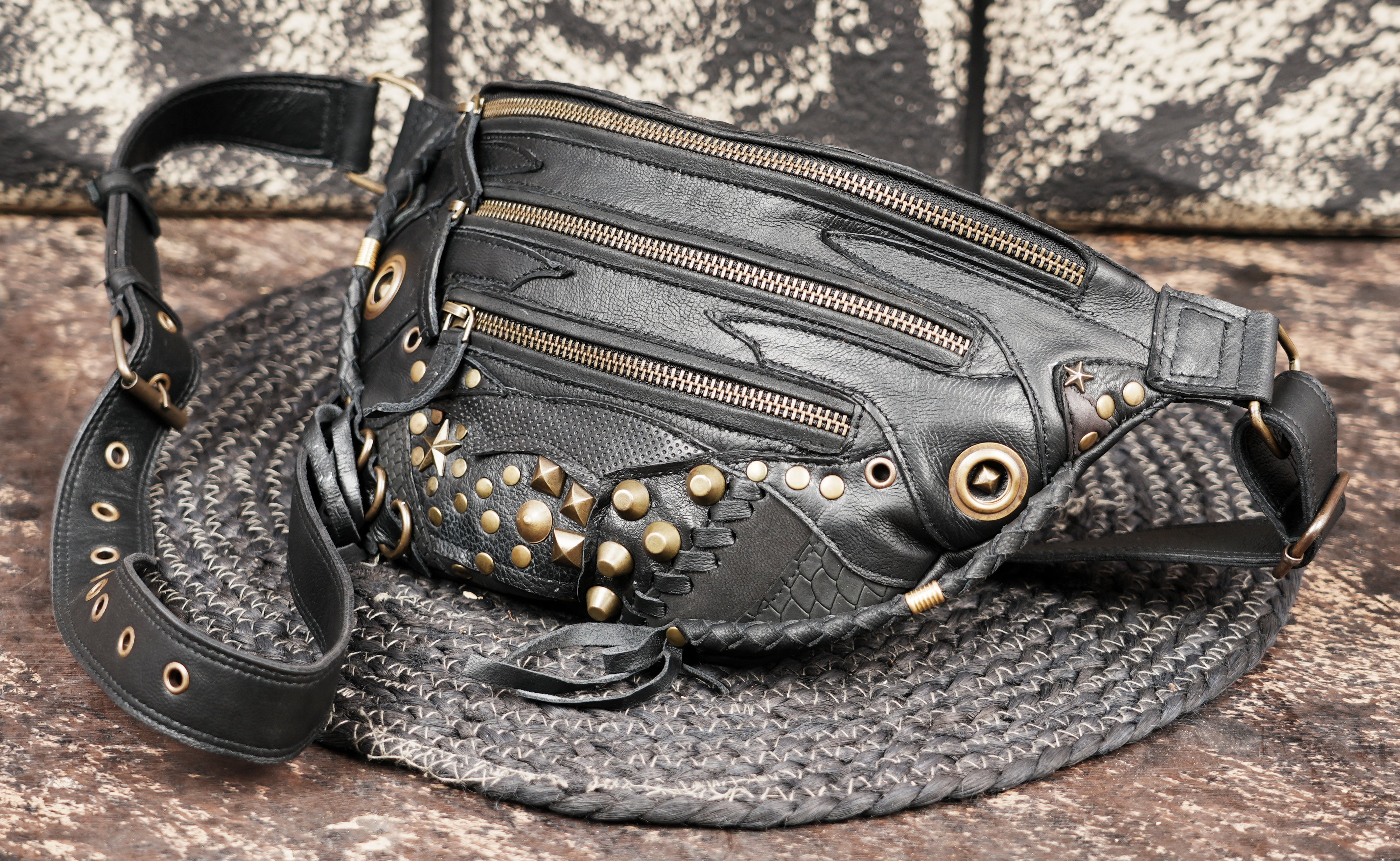 Steampunk inspired leather shoulder belt with metal hardware accents