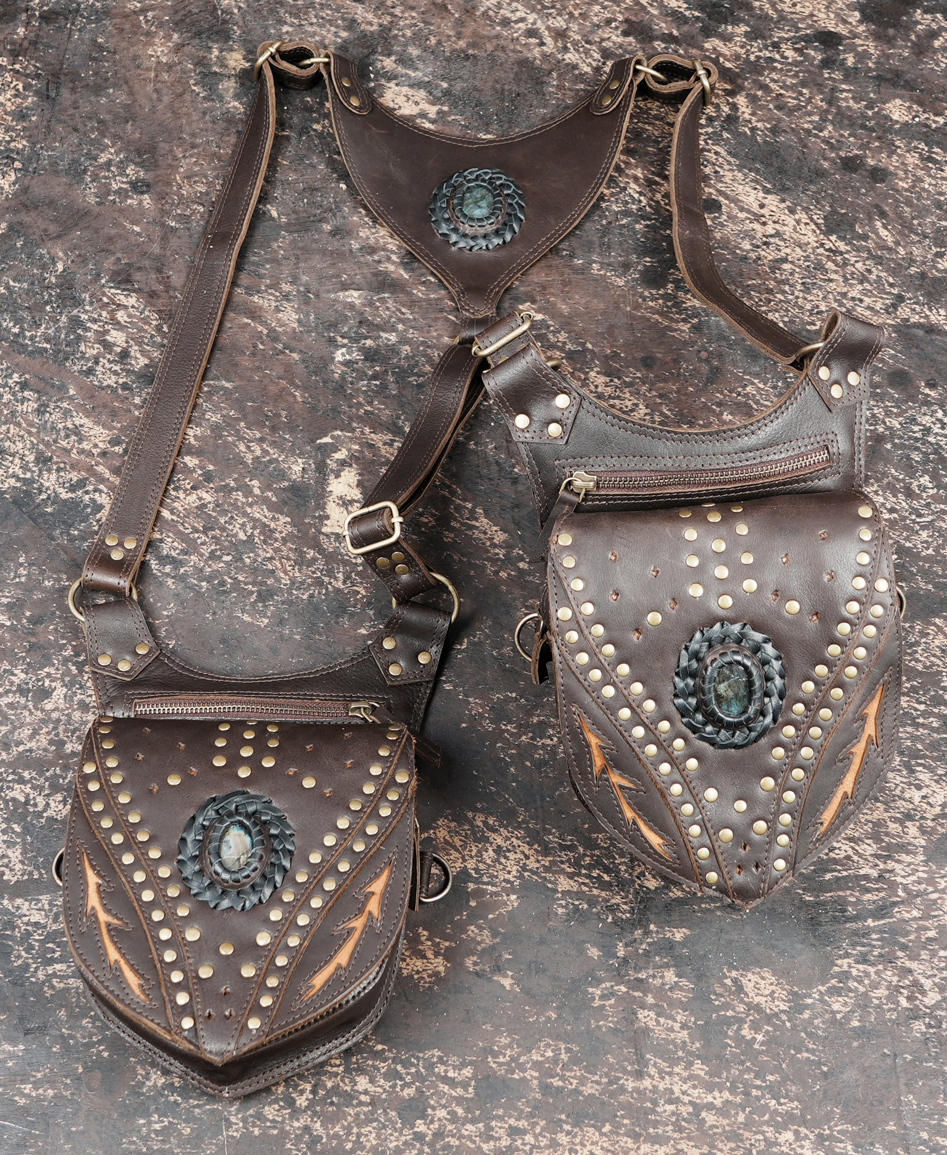 Tribal style leather holster with decorative studs and stitching