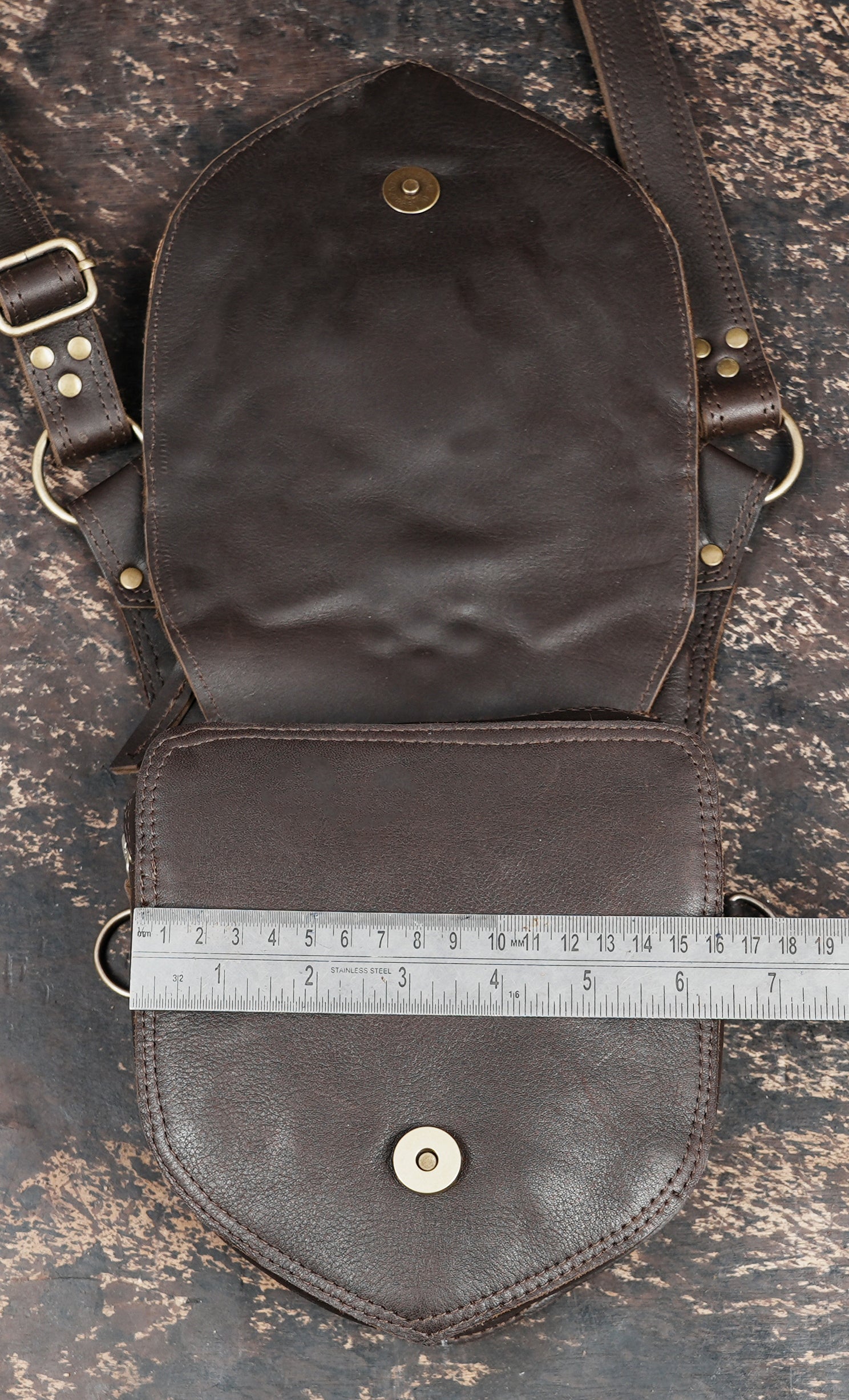 Dark brown leather shoulder holster for outdoor and festival wear