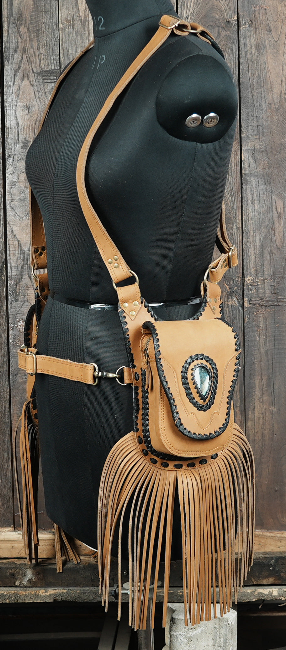 Unique leather shoulder holster for concerts and outdoor events