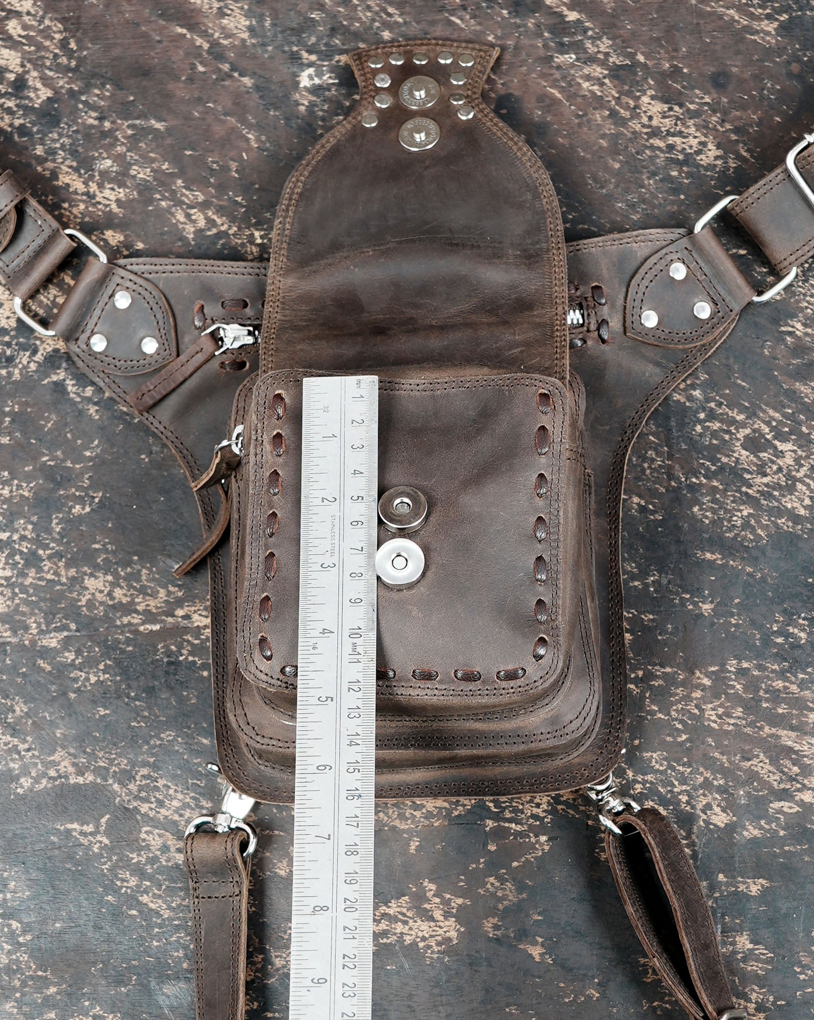 Adjustable leather waist and leg belt for hands-free carry