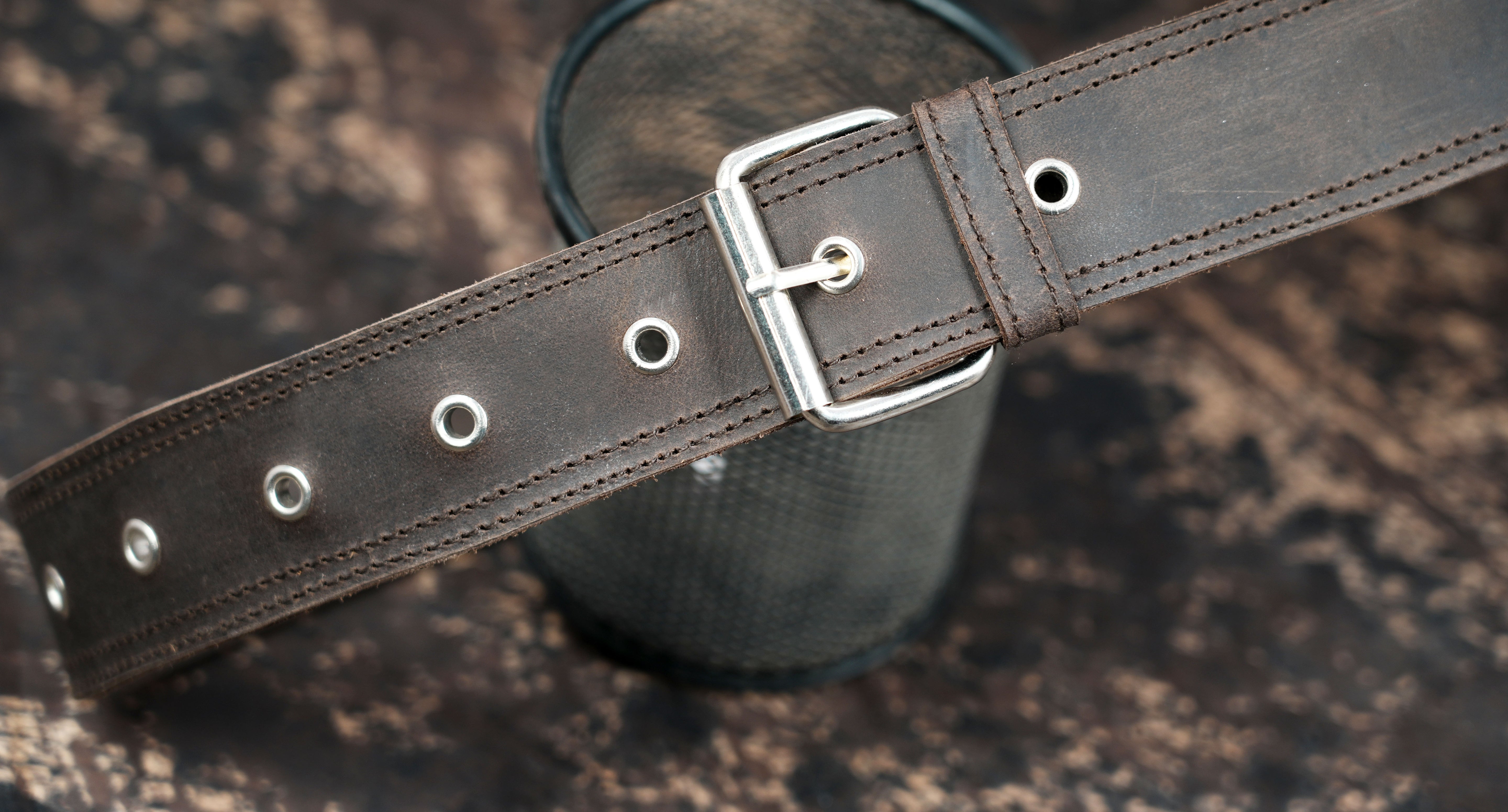 Leather waist thigh bag with layered pouch construction