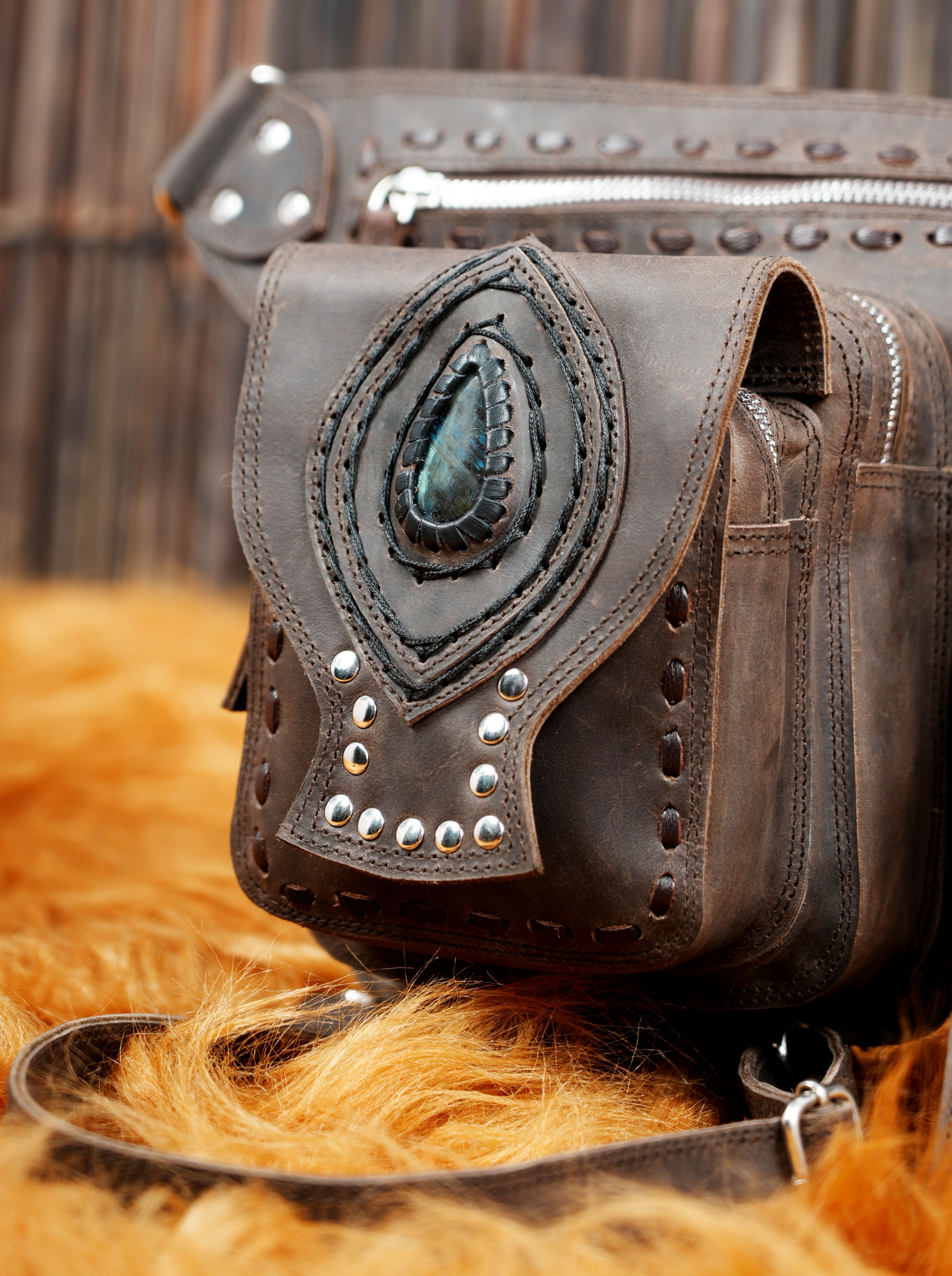 Brown leather utility thigh belt with buckle adjustments