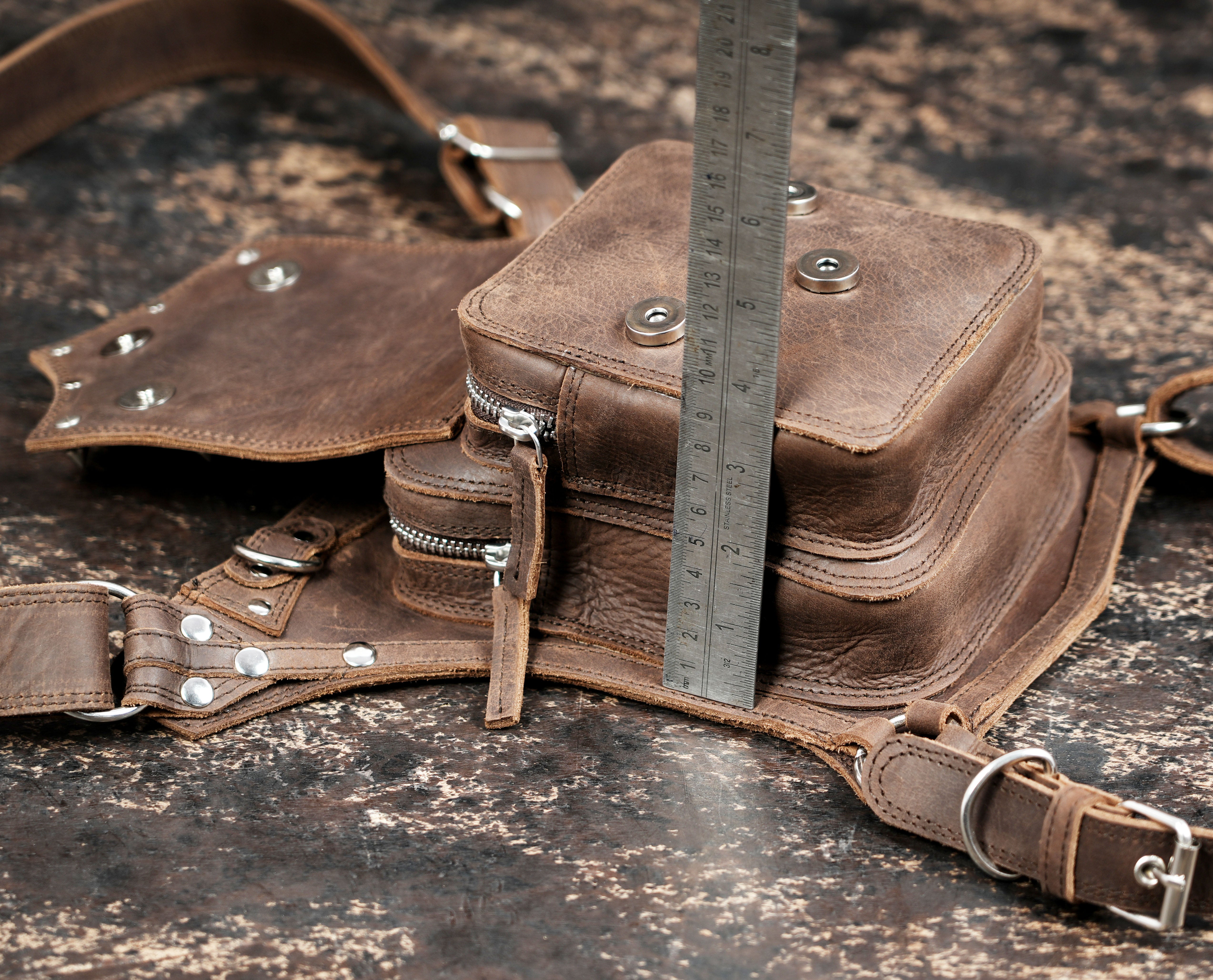Tribal style leather thigh belt with metal studs and rings