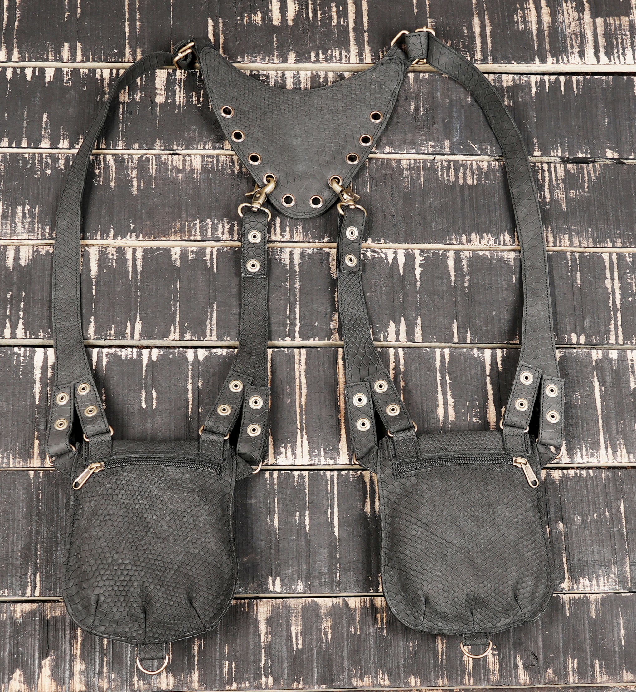 Multi-pocket leather shoulder holster for biker, travel, or cosplay use