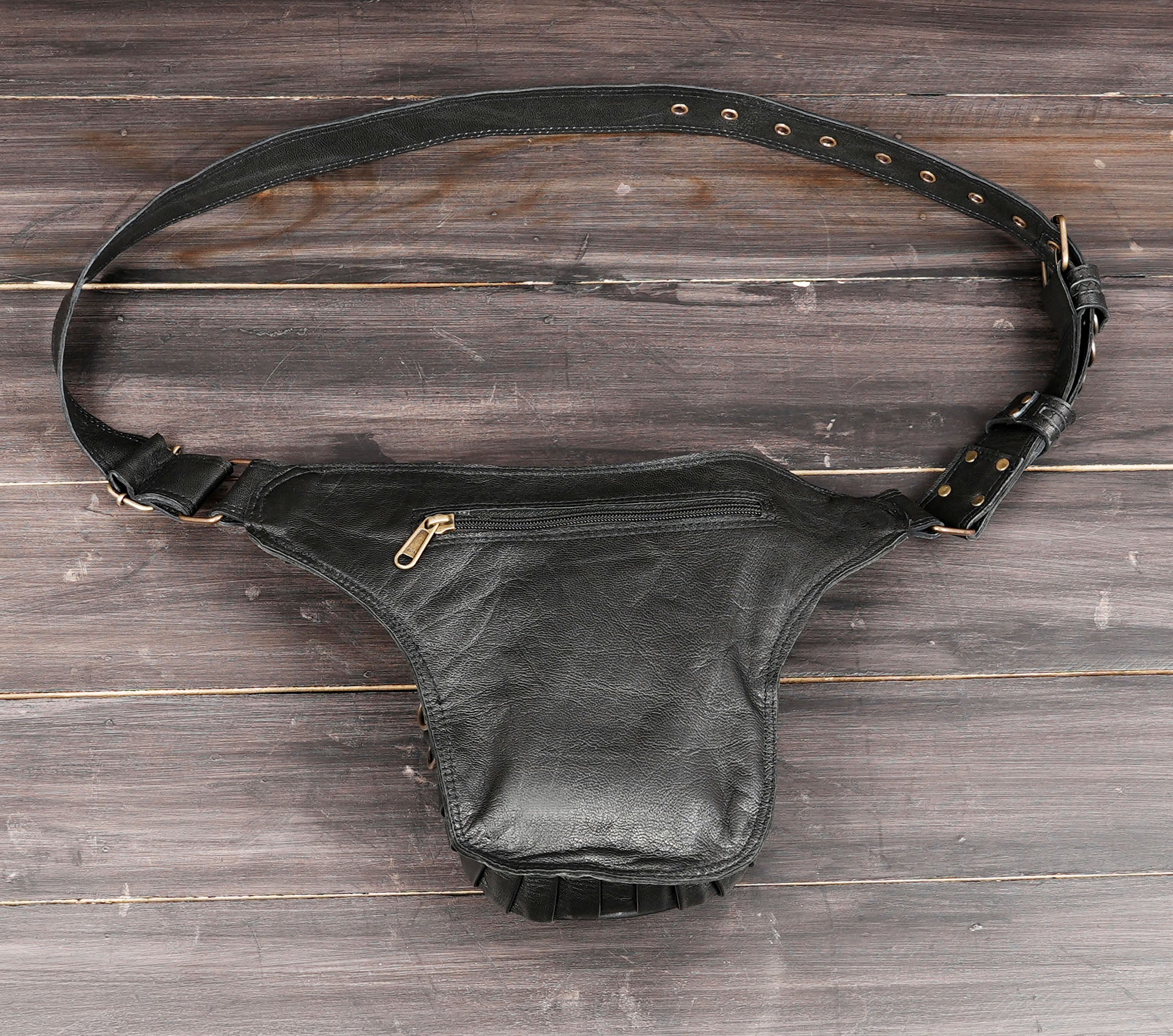 Leather waist belt pouch designed for phone, wallet, and small items
