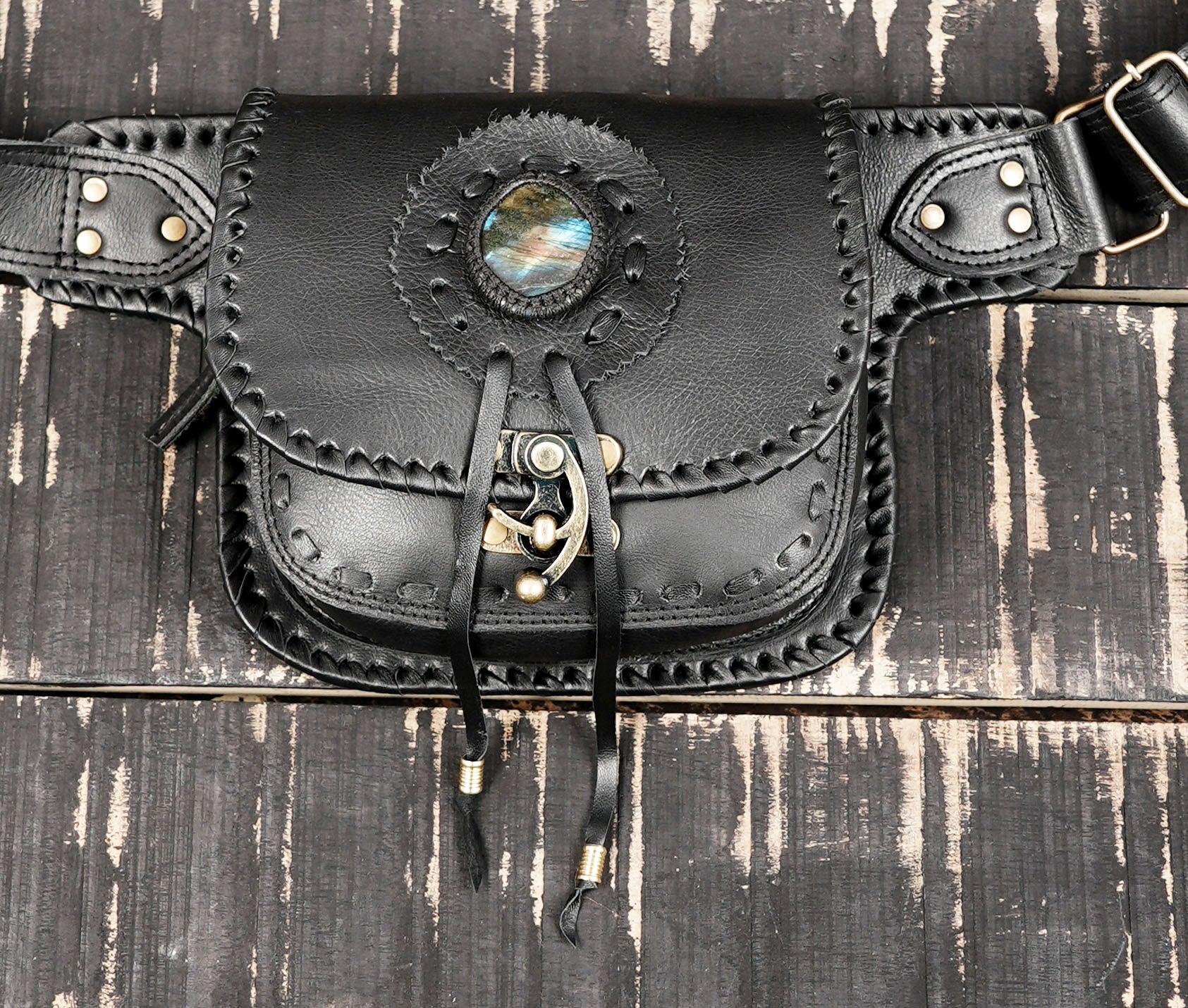 Genuine leather utility waist belt with adjustable buckle and snap closure