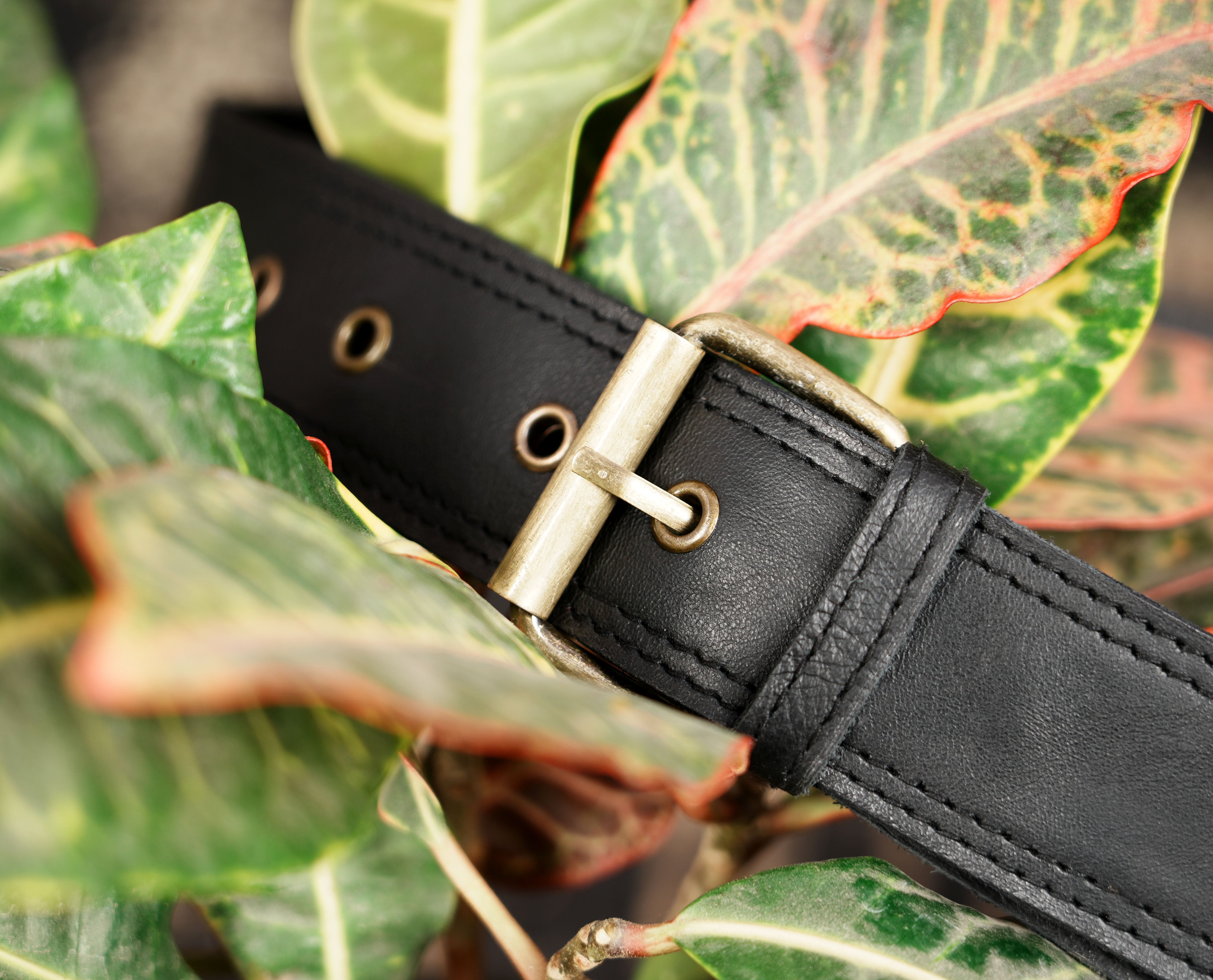 Leather waist belt with secure front pocket for phone and small essentials