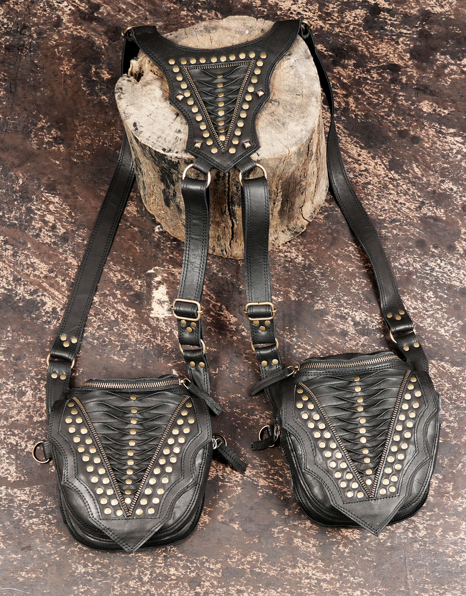 Unisex leather shoulder holster with dual compartments and secure closures