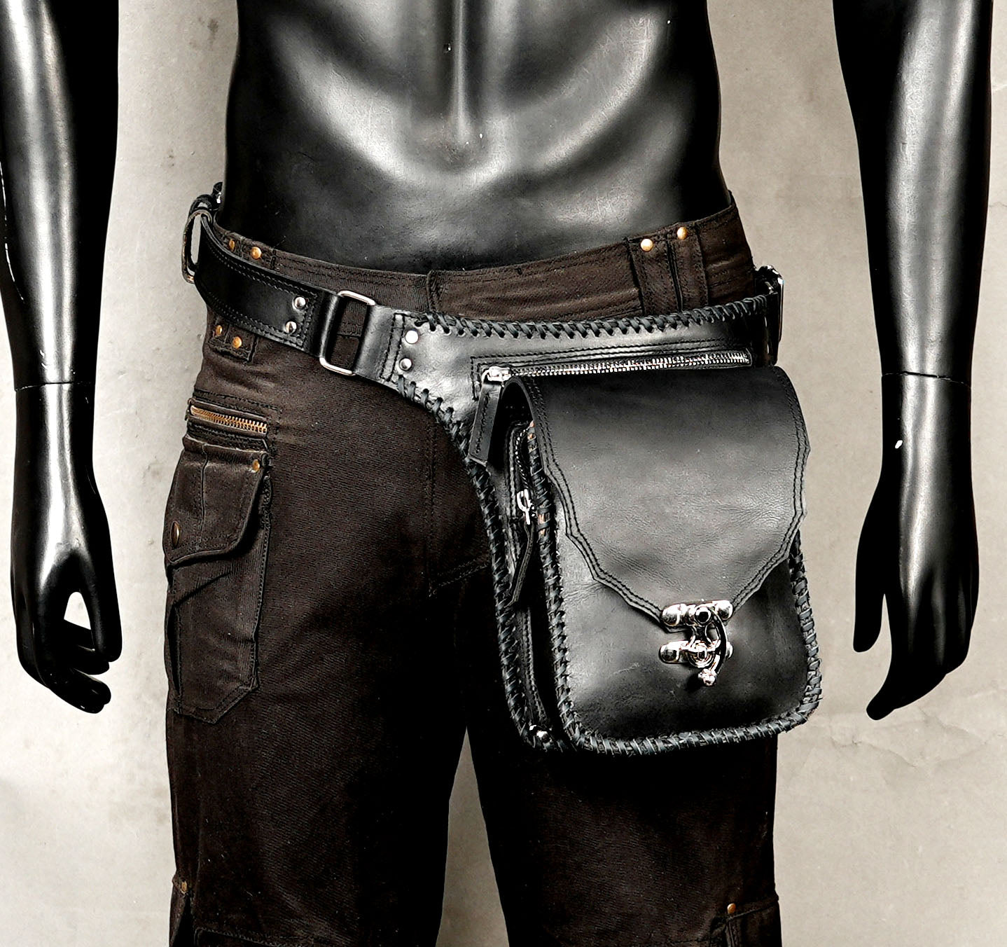 Braided leather waist bag.