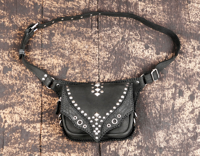 "Black leather waist belt bag with metal studs and textured edges"