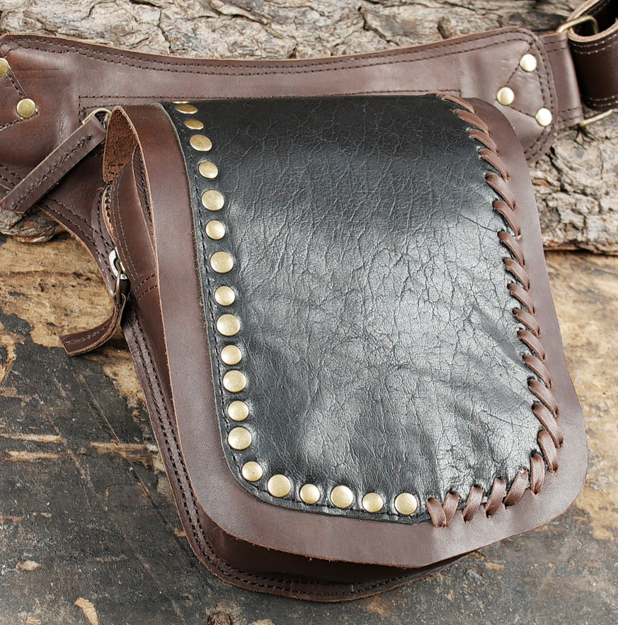 Brown leather waist utility belt featuring a studded front flap pocket   