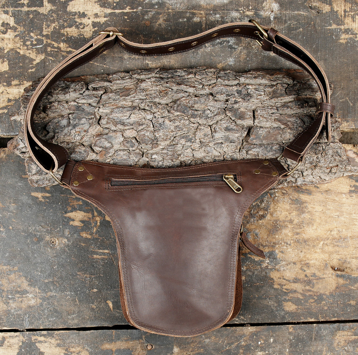 Brown leather belt with detachable pouch for urban nomad styling   