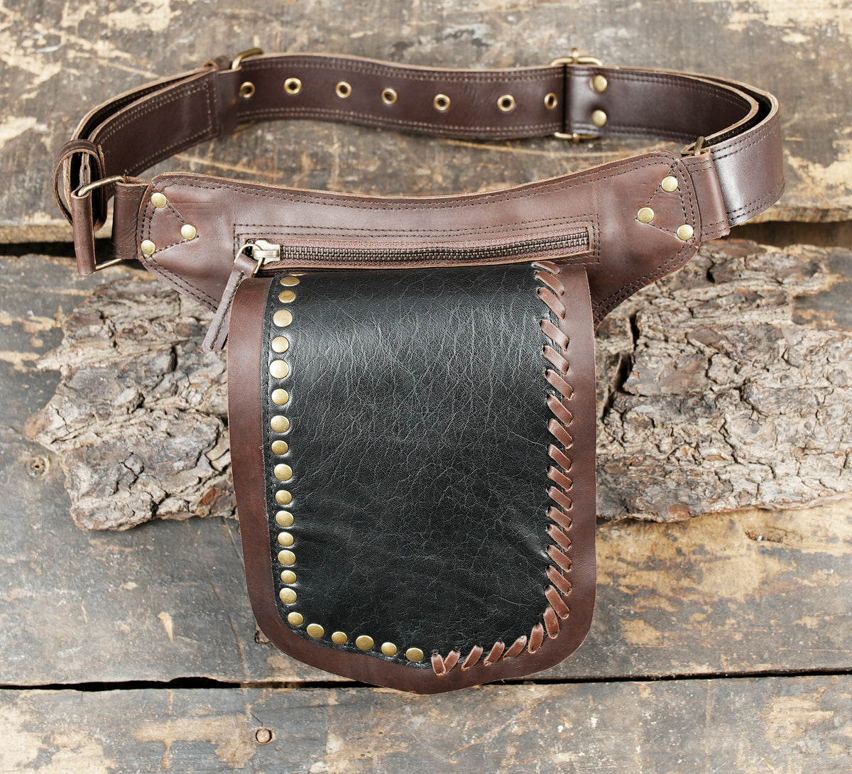  Handcrafted brown leather hip pouch with secure zipper closure   