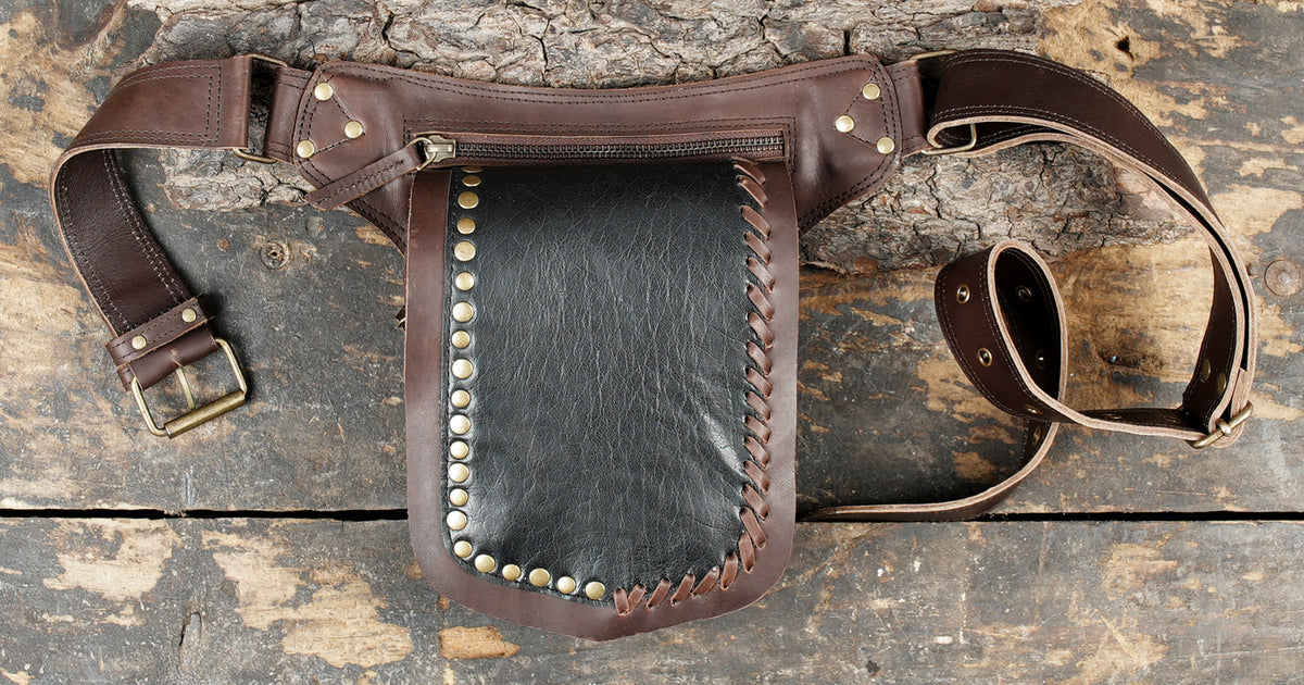  Genuine brown leather utility belt with hand-laced trim details   