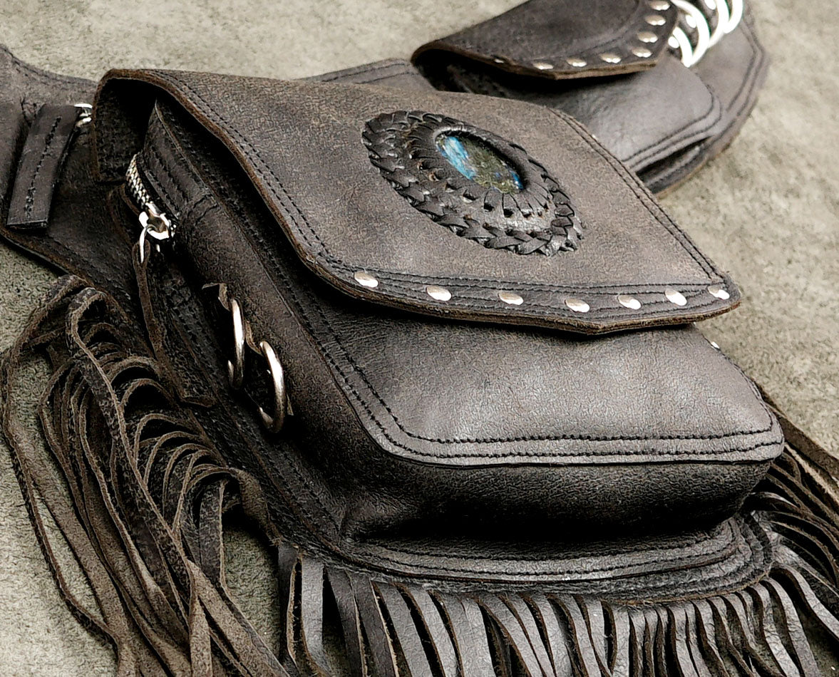 Dark brown fringe belt bag with practical storage pockets